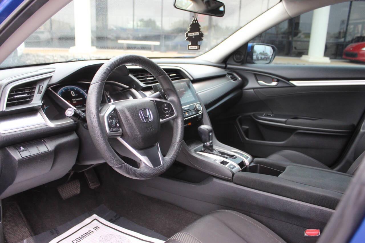 2016 Blue Honda Civic EX-T Sedan CVT (19XFC1F31GE) with an 1.5L L4 DOHC 16V TURBO engine, CVT transmission, located at 4301 NW 39th , Oklahoma City, OK, 73112, (405) 949-5600, 35.512135, -97.598671 - NO DRIVERS LICENCE -NO FULL COVERAGE INSURANCE - NO CREDIT CHECK. COME ON OVER TO SUPERSPORTS, TAKE A LOOK AND TEST DRIVE. PLEASE GIVE US A CALL AT (405) 949-5600. NO LICENCIA DE CONDUCIR - NO SEGURO DE COBERTURA TOTAL - NO VERIFICACION DE CREDITO. VISITENOS EN SUPERSPORTS, MIRE NUESTRO - Photo#15