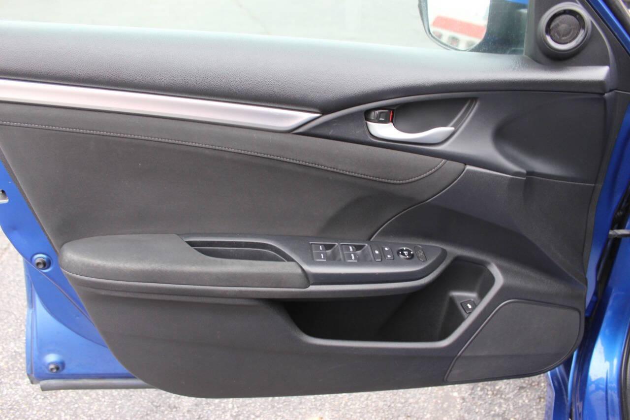 2016 Blue Honda Civic EX-T Sedan CVT (19XFC1F31GE) with an 1.5L L4 DOHC 16V TURBO engine, CVT transmission, located at 4301 NW 39th , Oklahoma City, OK, 73112, (405) 949-5600, 35.512135, -97.598671 - NO DRIVERS LICENCE -NO FULL COVERAGE INSURANCE - NO CREDIT CHECK. COME ON OVER TO SUPERSPORTS, TAKE A LOOK AND TEST DRIVE. PLEASE GIVE US A CALL AT (405) 949-5600. NO LICENCIA DE CONDUCIR - NO SEGURO DE COBERTURA TOTAL - NO VERIFICACION DE CREDITO. VISITENOS EN SUPERSPORTS, MIRE NUESTRO - Photo#16