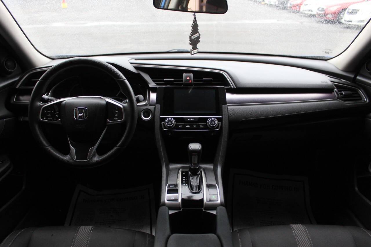 2016 Blue Honda Civic EX-T Sedan CVT (19XFC1F31GE) with an 1.5L L4 DOHC 16V TURBO engine, CVT transmission, located at 4301 NW 39th , Oklahoma City, OK, 73112, (405) 949-5600, 35.512135, -97.598671 - NO DRIVERS LICENCE -NO FULL COVERAGE INSURANCE - NO CREDIT CHECK. COME ON OVER TO SUPERSPORTS, TAKE A LOOK AND TEST DRIVE. PLEASE GIVE US A CALL AT (405) 949-5600. NO LICENCIA DE CONDUCIR - NO SEGURO DE COBERTURA TOTAL - NO VERIFICACION DE CREDITO. VISITENOS EN SUPERSPORTS, MIRE NUESTRO - Photo#19