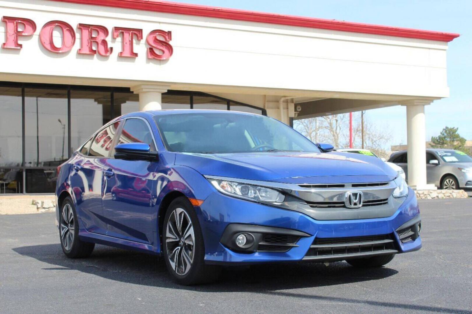 2016 Blue Honda Civic EX-T Sedan CVT (19XFC1F31GE) with an 1.5L L4 DOHC 16V TURBO engine, CVT transmission, located at 4301 NW 39th , Oklahoma City, OK, 73112, (405) 949-5600, 35.512135, -97.598671 - NO DRIVERS LICENSE - NO FULL COVERAGE INSURANCE - NO CREDIT CHECK. COME ON OVER TO SUPERSPORTS AND TAKE A LOOK AND TEST DRIVE PLEASE GIVE US A CALL AT (405) 949-5600. NO LICENCIA DE MANEJAR - NO SEGURO DE COBERTURA TOTAL- NO VERIFICACCION DE CREDITO. POR FAVOR VENGAN A SUPERSPORTS, ECHE - Photo#0