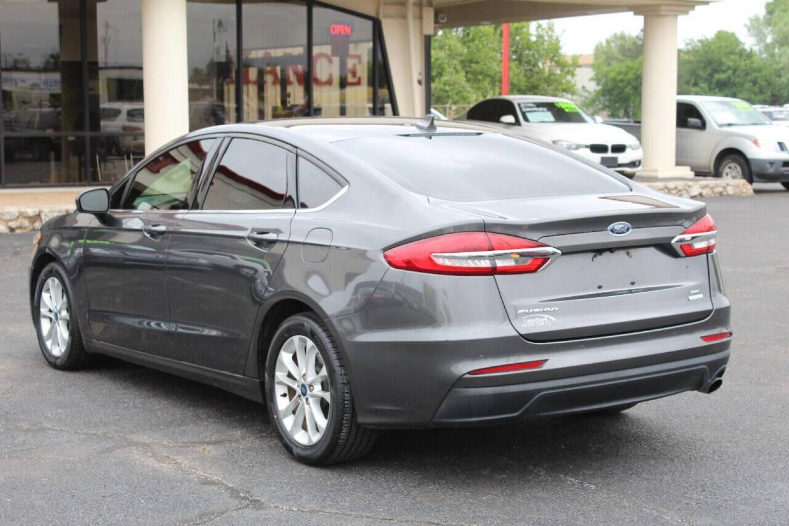 2019 Charcoal Ford Fusion SE (3FA6P0HD7KR) with an 1.5L L4 DOHC 16V engine, 6A transmission, located at 4301 NW 39th , Oklahoma City, OK, 73112, (405) 949-5600, 35.512135, -97.598671 - NO DRIVERS LICENCE NO-FULL COVERAGE INSURANCE-NO CREDIT CHECK. COME ON OVER TO SUPERSPORTS AND TAKE A LOOK AND TEST DRIVE PLEASE GIVE US A CALL AT (405) 949-5600. NO LICENSIA DE MANEJAR- NO SEGURO DE COBERTURA TOTAL- NO VERIFICACCION DE CREDITO. POR FAVOR VENGAN A SUPERSPORTS, - Photo#5