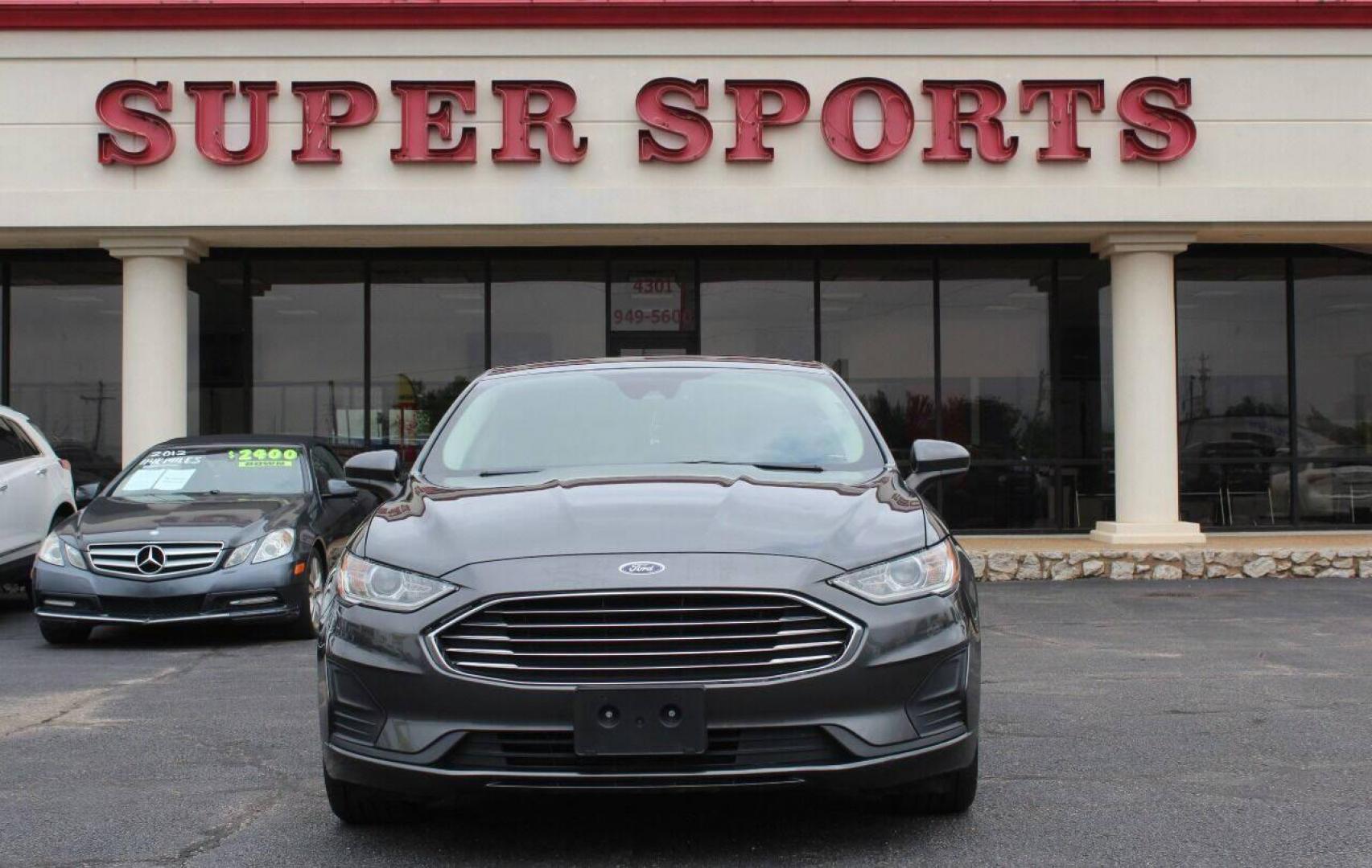 2019 Charcoal Ford Fusion SE (3FA6P0HD7KR) with an 1.5L L4 DOHC 16V engine, 6A transmission, located at 4301 NW 39th , Oklahoma City, OK, 73112, (405) 949-5600, 35.512135, -97.598671 - NO DRIVERS LICENCE NO-FULL COVERAGE INSURANCE-NO CREDIT CHECK. COME ON OVER TO SUPERSPORTS AND TAKE A LOOK AND TEST DRIVE PLEASE GIVE US A CALL AT (405) 949-5600. NO LICENSIA DE MANEJAR- NO SEGURO DE COBERTURA TOTAL- NO VERIFICACCION DE CREDITO. POR FAVOR VENGAN A SUPERSPORTS, - Photo#0