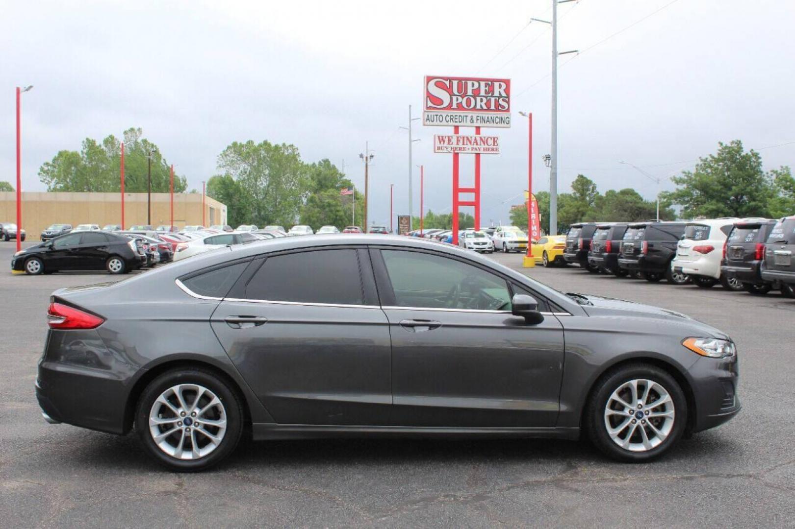 2019 Charcoal Ford Fusion SE (3FA6P0HD7KR) with an 1.5L L4 DOHC 16V engine, 6A transmission, located at 4301 NW 39th , Oklahoma City, OK, 73112, (405) 949-5600, 35.512135, -97.598671 - NO DRIVERS LICENCE NO-FULL COVERAGE INSURANCE-NO CREDIT CHECK. COME ON OVER TO SUPERSPORTS AND TAKE A LOOK AND TEST DRIVE PLEASE GIVE US A CALL AT (405) 949-5600. NO LICENSIA DE MANEJAR- NO SEGURO DE COBERTURA TOTAL- NO VERIFICACCION DE CREDITO. POR FAVOR VENGAN A SUPERSPORTS, - Photo#2