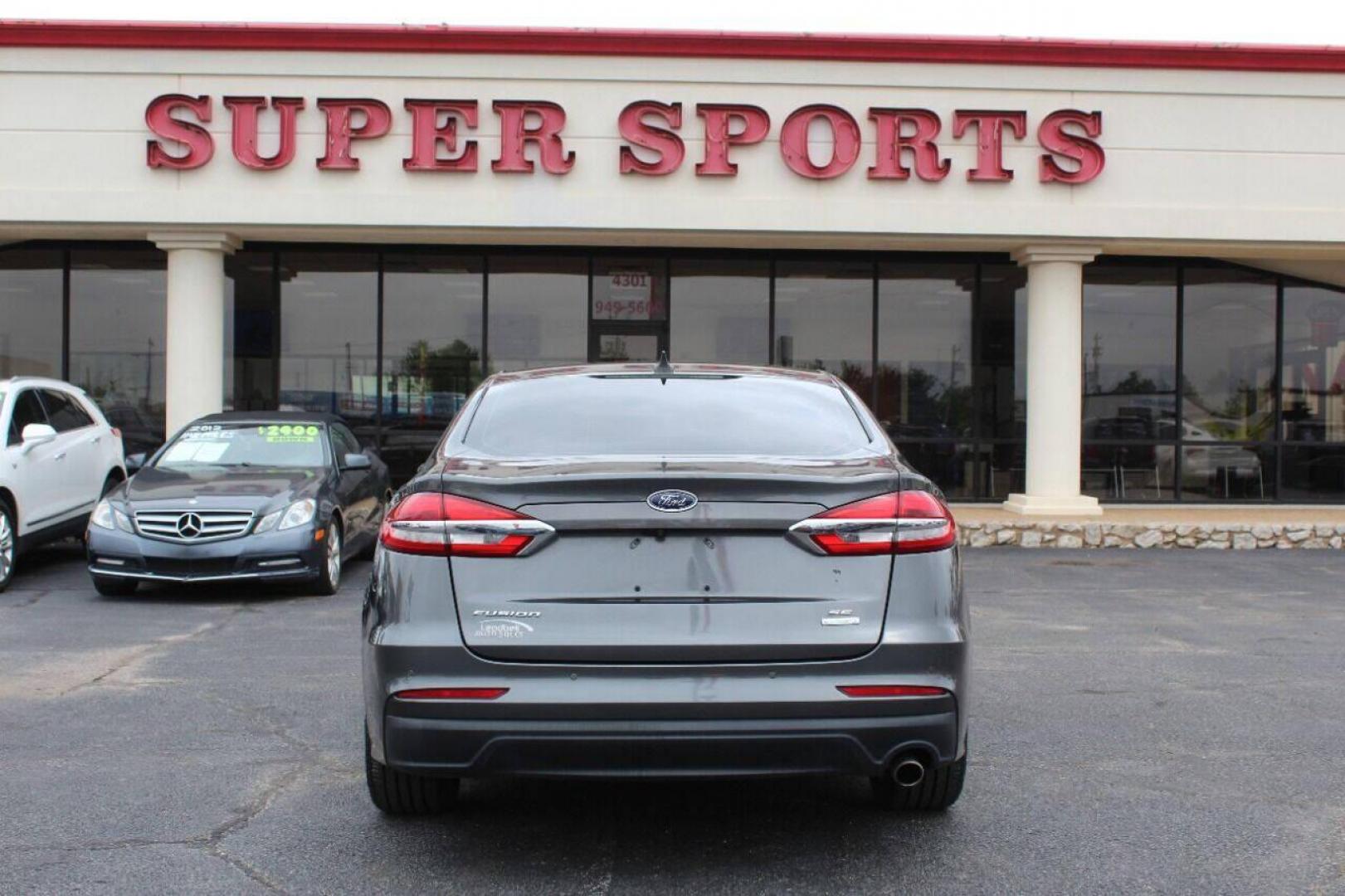 2019 Charcoal Ford Fusion SE (3FA6P0HD7KR) with an 1.5L L4 DOHC 16V engine, 6A transmission, located at 4301 NW 39th , Oklahoma City, OK, 73112, (405) 949-5600, 35.512135, -97.598671 - NO DRIVERS LICENCE NO-FULL COVERAGE INSURANCE-NO CREDIT CHECK. COME ON OVER TO SUPERSPORTS AND TAKE A LOOK AND TEST DRIVE PLEASE GIVE US A CALL AT (405) 949-5600. NO LICENSIA DE MANEJAR- NO SEGURO DE COBERTURA TOTAL- NO VERIFICACCION DE CREDITO. POR FAVOR VENGAN A SUPERSPORTS, - Photo#4