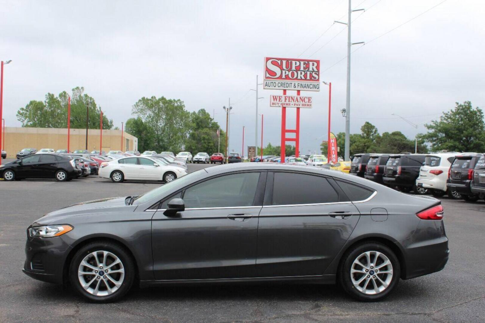 2019 Charcoal Ford Fusion SE (3FA6P0HD7KR) with an 1.5L L4 DOHC 16V engine, 6A transmission, located at 4301 NW 39th , Oklahoma City, OK, 73112, (405) 949-5600, 35.512135, -97.598671 - NO DRIVERS LICENCE NO-FULL COVERAGE INSURANCE-NO CREDIT CHECK. COME ON OVER TO SUPERSPORTS AND TAKE A LOOK AND TEST DRIVE PLEASE GIVE US A CALL AT (405) 949-5600. NO LICENSIA DE MANEJAR- NO SEGURO DE COBERTURA TOTAL- NO VERIFICACCION DE CREDITO. POR FAVOR VENGAN A SUPERSPORTS, - Photo#6