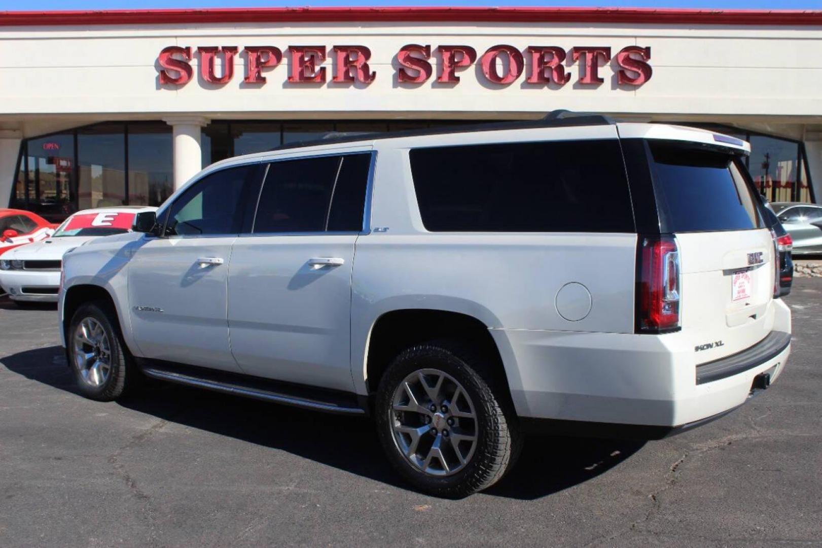 2015 White GMC Yukon XL SLT 1/2 Ton 4WD (1GKS2HKCXFR) with an 5.3L V8 OHV 16V engine, 6-Speed Automatic transmission, located at 4301 NW 39th , Oklahoma City, OK, 73112, (405) 949-5600, 35.512135, -97.598671 - NO DRIVERS LICENCE NO-FULL COVERAGE INSURANCE-NO CREDIT CHECK. COME ON OVER TO SUPERSPORTS AND TAKE A LOOK AND TEST DRIVE. PLEASE GIVE US A CALL AT (405) 949-5600. NO LICENSIA DE MANEJAR- NO SEGURO DE COBERTURA TOTAL- NO VERIFICACCION DE CREDITO. POR FAVOR VENGAN A SUPERSPORTS, ECHE UN - Photo#5