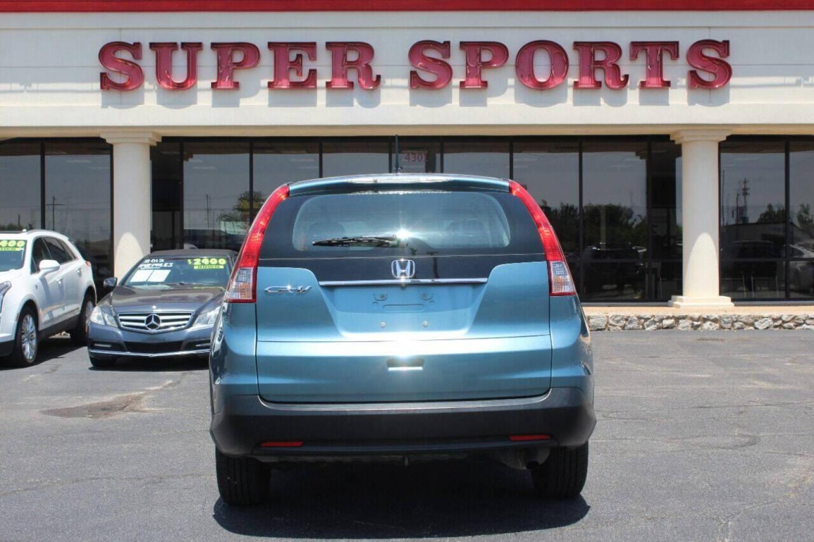2014 Teal Honda CR-V LX 2WD 5-Speed AT (2HKRM3H33EH) with an 2.4L L4 DOHC 16V engine, 5-Speed Automatic transmission, located at 4301 NW 39th , Oklahoma City, OK, 73112, (405) 949-5600, 35.512135, -97.598671 - NO DRIVERS LICENCE NO-FULL COVERAGE INSURANCE-NO CREDIT CHECK. COME ON OVER TO SUPERSPORTS AND TAKE A LOOK AND TEST DRIVE. PLEASE GIVE US A CALL AT (405) 949-5600. NO LICENSIA DE MANEJAR- NO SEGURO DE COBERTURA TOTAL- NO VERIFICACCION DE CREDITO. POR FAVOR VENGAN A SUPERSPORTS, ECHE UN - Photo#5