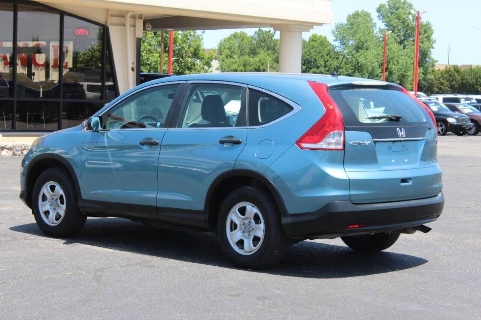 2014 Teal Honda CR-V LX 2WD 5-Speed AT (2HKRM3H33EH) with an 2.4L L4 DOHC 16V engine, 5-Speed Automatic transmission, located at 4301 NW 39th , Oklahoma City, OK, 73112, (405) 949-5600, 35.512135, -97.598671 - NO DRIVERS LICENCE NO-FULL COVERAGE INSURANCE-NO CREDIT CHECK. COME ON OVER TO SUPERSPORTS AND TAKE A LOOK AND TEST DRIVE. PLEASE GIVE US A CALL AT (405) 949-5600. NO LICENSIA DE MANEJAR- NO SEGURO DE COBERTURA TOTAL- NO VERIFICACCION DE CREDITO. POR FAVOR VENGAN A SUPERSPORTS, ECHE UN - Photo#6