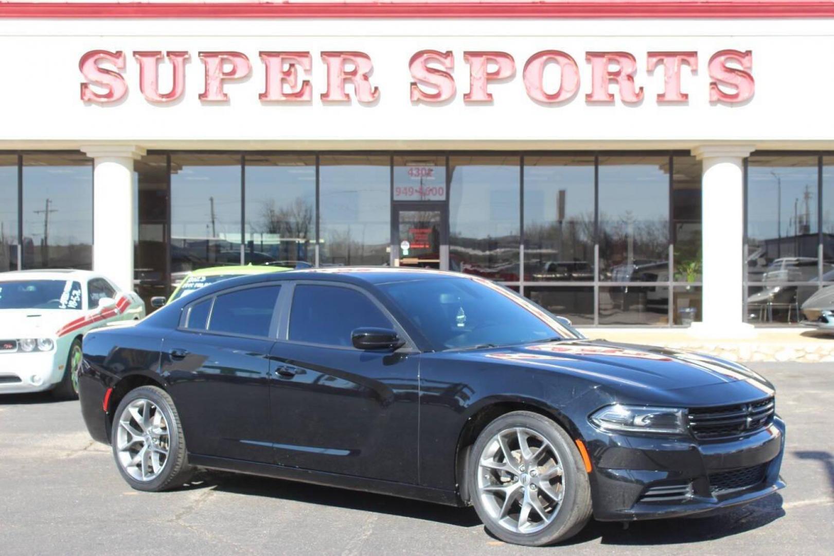 2022 Black Dodge Charger SXT (2C3CDXBG6NH) with an 3.6L V6 DOHC 24V engine, 8A transmission, located at 4301 NW 39th , Oklahoma City, OK, 73112, (405) 949-5600, 35.512135, -97.598671 - NO DRIVERS LICENCE NO-FULL COVERAGE INSURANCE-NO CREDIT CHECK. COME ON OVER TO SUPERSPORTS AND TAKE A LOOK AND TEST DRIVE. PLEASE GIVE US A CALL AT (405) 949-5600. NO LICENSIA DE MANEJAR- NO SEGURO DE COBERTURA TOTAL- NO VERIFICACCION DE CREDITO. POR FAVOR VENGAN A SUPERSPORTS, ECHE UN - Photo#2