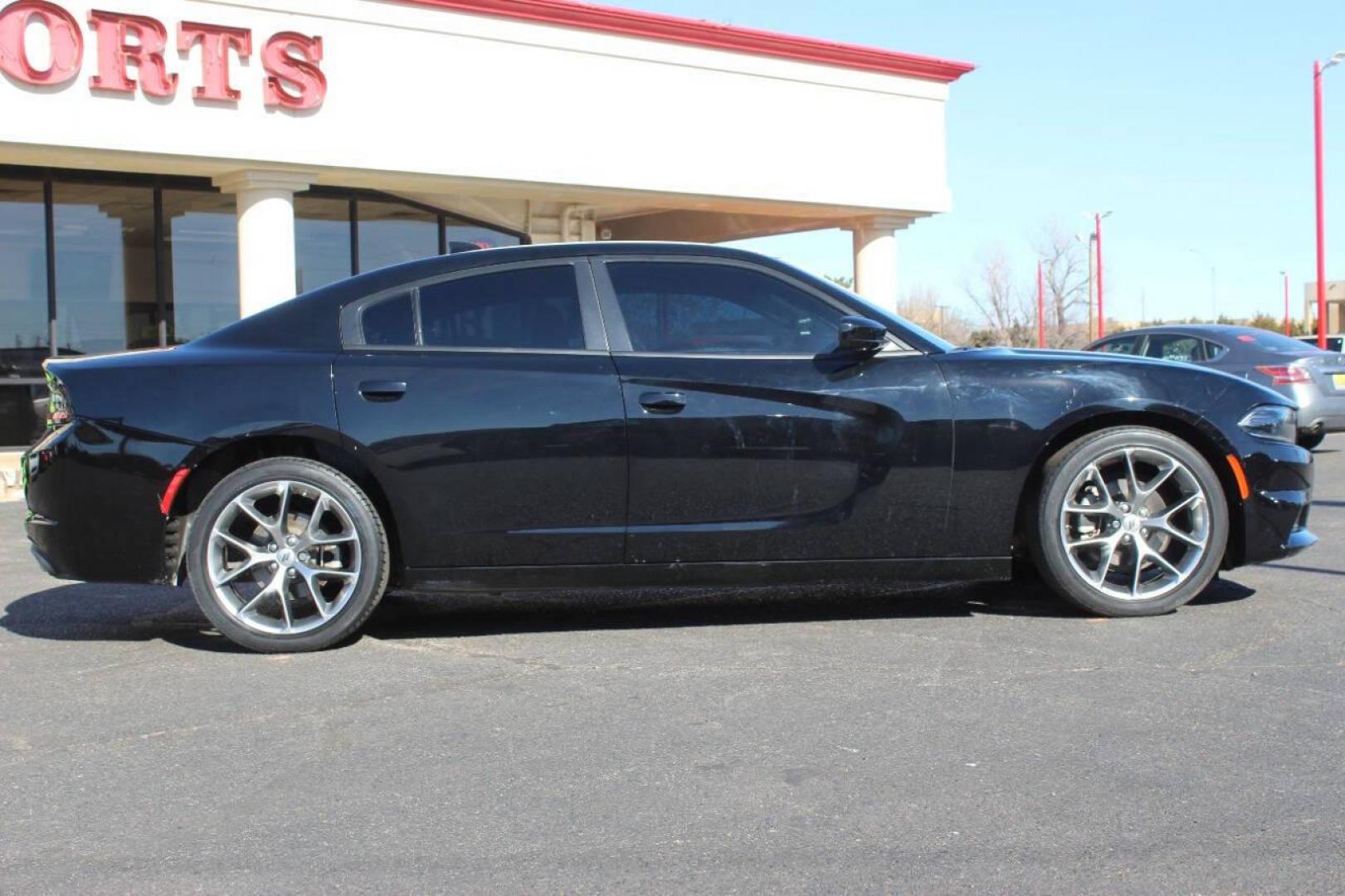 2022 Black Dodge Charger SXT (2C3CDXBG6NH) with an 3.6L V6 DOHC 24V engine, 8A transmission, located at 4301 NW 39th , Oklahoma City, OK, 73112, (405) 949-5600, 35.512135, -97.598671 - NO DRIVERS LICENCE NO-FULL COVERAGE INSURANCE-NO CREDIT CHECK. COME ON OVER TO SUPERSPORTS AND TAKE A LOOK AND TEST DRIVE. PLEASE GIVE US A CALL AT (405) 949-5600. NO LICENSIA DE MANEJAR- NO SEGURO DE COBERTURA TOTAL- NO VERIFICACCION DE CREDITO. POR FAVOR VENGAN A SUPERSPORTS, ECHE UN - Photo#3