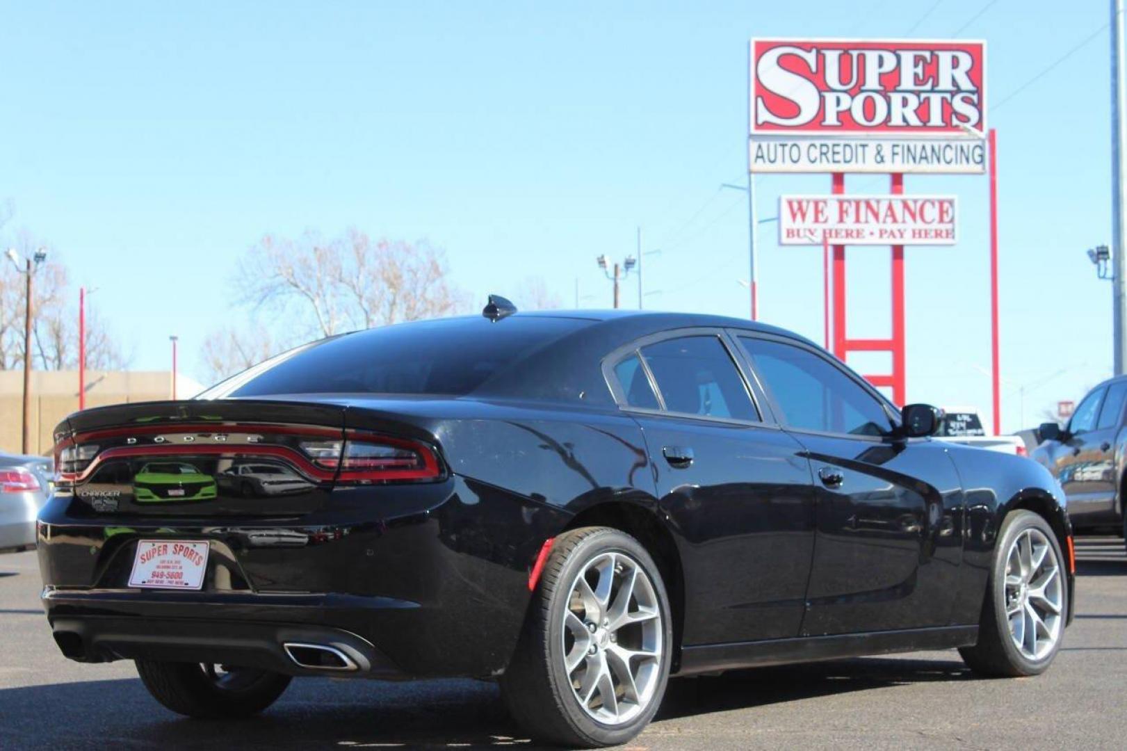 2022 Black Dodge Charger SXT (2C3CDXBG6NH) with an 3.6L V6 DOHC 24V engine, 8A transmission, located at 4301 NW 39th , Oklahoma City, OK, 73112, (405) 949-5600, 35.512135, -97.598671 - NO DRIVERS LICENCE NO-FULL COVERAGE INSURANCE-NO CREDIT CHECK. COME ON OVER TO SUPERSPORTS AND TAKE A LOOK AND TEST DRIVE. PLEASE GIVE US A CALL AT (405) 949-5600. NO LICENSIA DE MANEJAR- NO SEGURO DE COBERTURA TOTAL- NO VERIFICACCION DE CREDITO. POR FAVOR VENGAN A SUPERSPORTS, ECHE UN - Photo#4