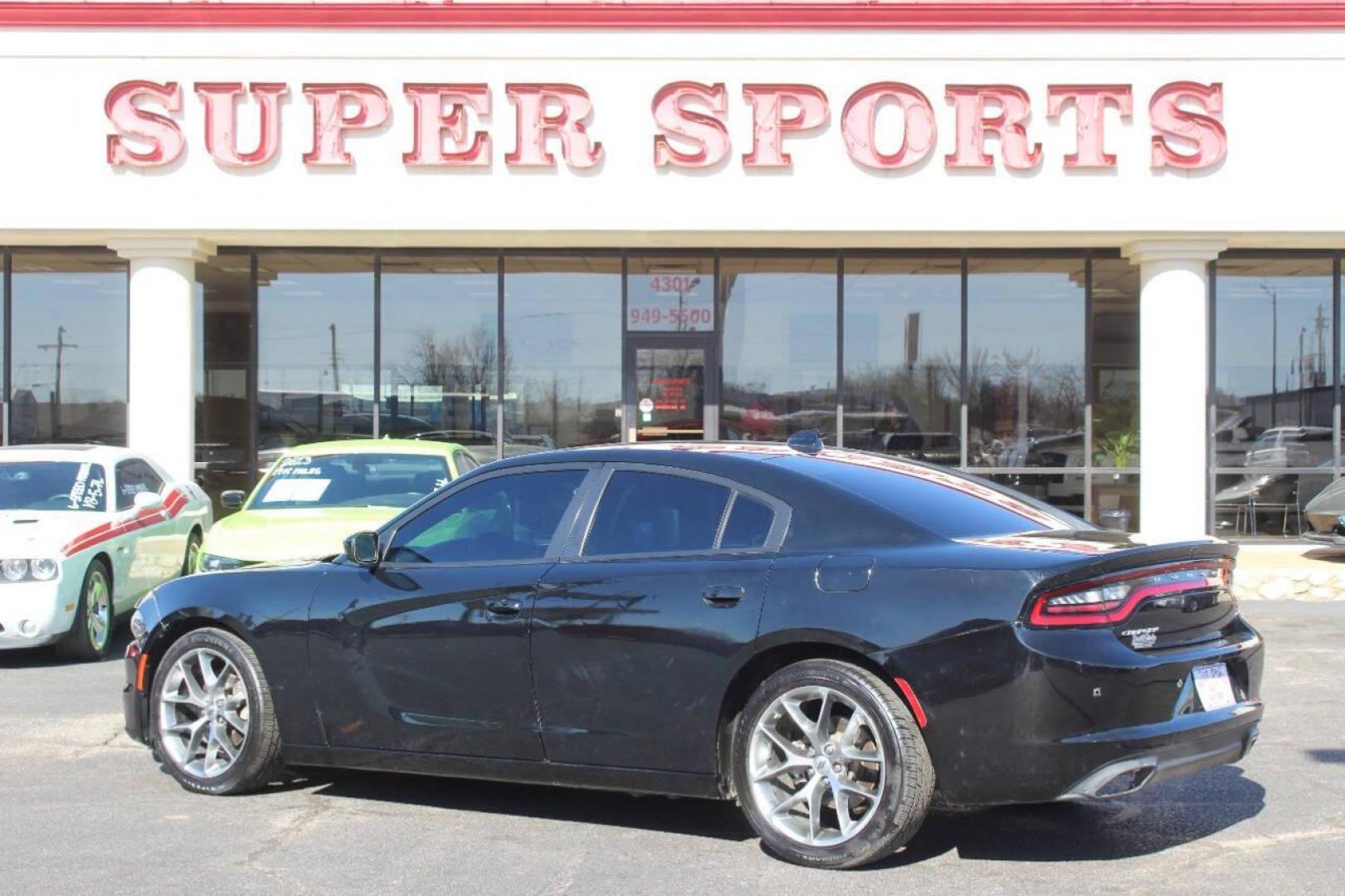 2022 Black Dodge Charger SXT (2C3CDXBG6NH) with an 3.6L V6 DOHC 24V engine, 8A transmission, located at 4301 NW 39th , Oklahoma City, OK, 73112, (405) 949-5600, 35.512135, -97.598671 - NO DRIVERS LICENCE NO-FULL COVERAGE INSURANCE-NO CREDIT CHECK. COME ON OVER TO SUPERSPORTS AND TAKE A LOOK AND TEST DRIVE. PLEASE GIVE US A CALL AT (405) 949-5600. NO LICENSIA DE MANEJAR- NO SEGURO DE COBERTURA TOTAL- NO VERIFICACCION DE CREDITO. POR FAVOR VENGAN A SUPERSPORTS, ECHE UN - Photo#5