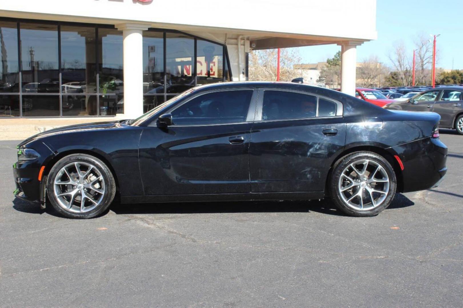 2022 Black Dodge Charger SXT (2C3CDXBG6NH) with an 3.6L V6 DOHC 24V engine, 8A transmission, located at 4301 NW 39th , Oklahoma City, OK, 73112, (405) 949-5600, 35.512135, -97.598671 - NO DRIVERS LICENCE NO-FULL COVERAGE INSURANCE-NO CREDIT CHECK. COME ON OVER TO SUPERSPORTS AND TAKE A LOOK AND TEST DRIVE. PLEASE GIVE US A CALL AT (405) 949-5600. NO LICENSIA DE MANEJAR- NO SEGURO DE COBERTURA TOTAL- NO VERIFICACCION DE CREDITO. POR FAVOR VENGAN A SUPERSPORTS, ECHE UN - Photo#6