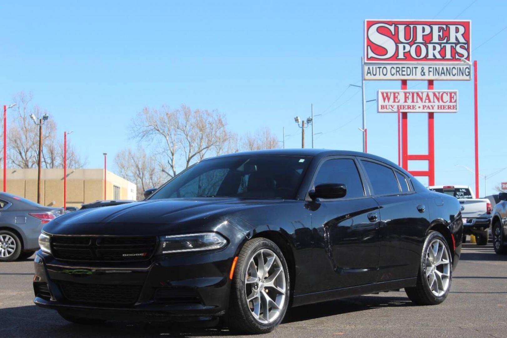 2022 Black Dodge Charger SXT (2C3CDXBG6NH) with an 3.6L V6 DOHC 24V engine, 8A transmission, located at 4301 NW 39th , Oklahoma City, OK, 73112, (405) 949-5600, 35.512135, -97.598671 - NO DRIVERS LICENCE NO-FULL COVERAGE INSURANCE-NO CREDIT CHECK. COME ON OVER TO SUPERSPORTS AND TAKE A LOOK AND TEST DRIVE. PLEASE GIVE US A CALL AT (405) 949-5600. NO LICENSIA DE MANEJAR- NO SEGURO DE COBERTURA TOTAL- NO VERIFICACCION DE CREDITO. POR FAVOR VENGAN A SUPERSPORTS, ECHE UN - Photo#7