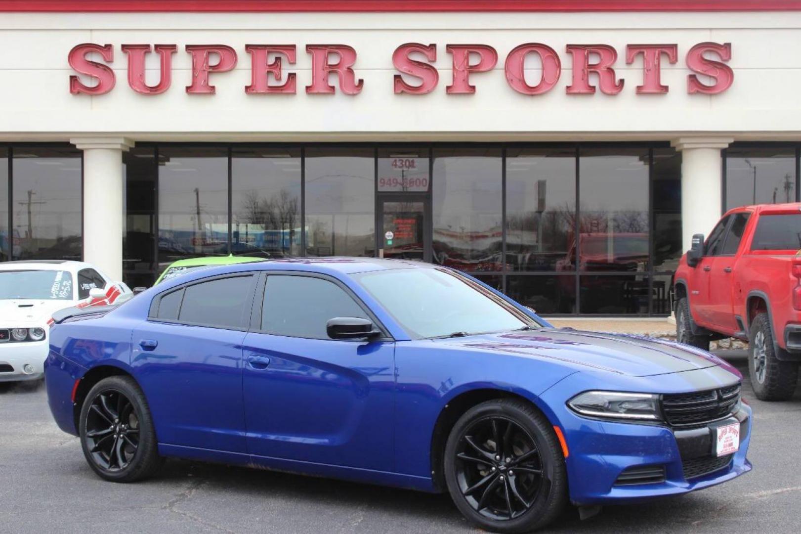 2018 Black Dodge Charger SE (2C3CDXBG9JH) with an 3.6L V6 DOHC 24V engine, 8A transmission, located at 4301 NW 39th , Oklahoma City, OK, 73112, (405) 949-5600, 35.512135, -97.598671 - NO DRIVERS LICENCE NO-FULL COVERAGE INSURANCE-NO CREDIT CHECK. COME ON OVER TO SUPERSPORTS AND TAKE A LOOK AND TEST DRIVE. PLEASE GIVE US A CALL AT (405) 949-5600. NO LICENSIA DE MANEJAR- NO SEGURO DE COBERTURA TOTAL- NO VERIFICACCION DE CREDITO. POR FAVOR VENGAN A SUPERSPORTS, ECHE UN - Photo#0