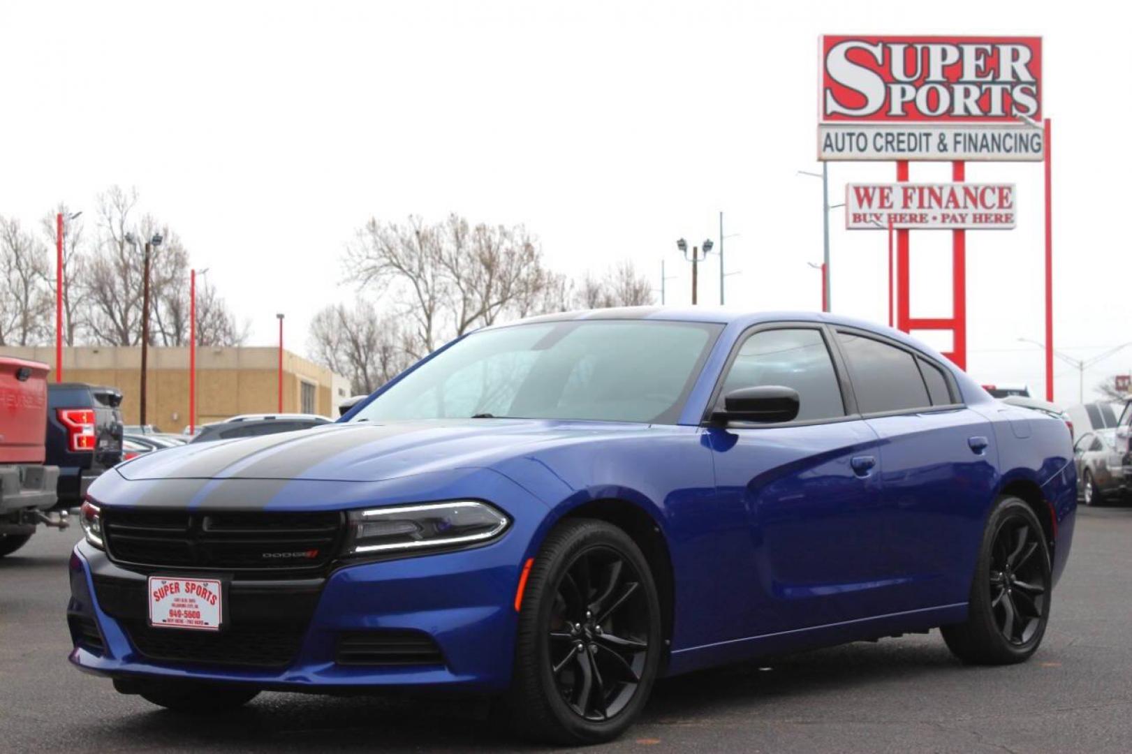 2018 Black Dodge Charger SE (2C3CDXBG9JH) with an 3.6L V6 DOHC 24V engine, 8A transmission, located at 4301 NW 39th , Oklahoma City, OK, 73112, (405) 949-5600, 35.512135, -97.598671 - NO DRIVERS LICENCE NO-FULL COVERAGE INSURANCE-NO CREDIT CHECK. COME ON OVER TO SUPERSPORTS AND TAKE A LOOK AND TEST DRIVE. PLEASE GIVE US A CALL AT (405) 949-5600. NO LICENSIA DE MANEJAR- NO SEGURO DE COBERTURA TOTAL- NO VERIFICACCION DE CREDITO. POR FAVOR VENGAN A SUPERSPORTS, ECHE UN - Photo#6