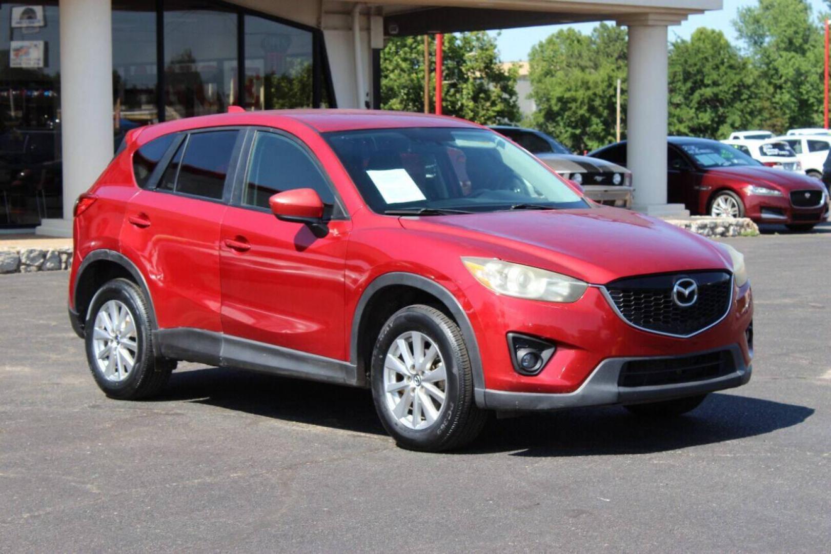 2015 Red Mazda CX-5 Touring (JM3KE2CYXF0) with an 2.5L L4 DOHC 16V engine, 6-Speed Automatic transmission, located at 4301 NW 39th , Oklahoma City, OK, 73112, (405) 949-5600, 35.512135, -97.598671 - NO DRIVERS LICENCE - NO FULL COVERAGE INSURANCE - NO CREDIT CHECK. COME ON OVER TO SUPERSPORTS AND TAKE A LOOK AND TEST DRIVE. PLEASE GIVE US A CALL AT (405) 949-5600. NO LICENCIA DE MANEJAR - NO SEGURO DE COBERTURA TOTAL - NO VERIFICACION DE CREDITO. POR FAVOR VENGAN A SUPERSPO - Photo#0