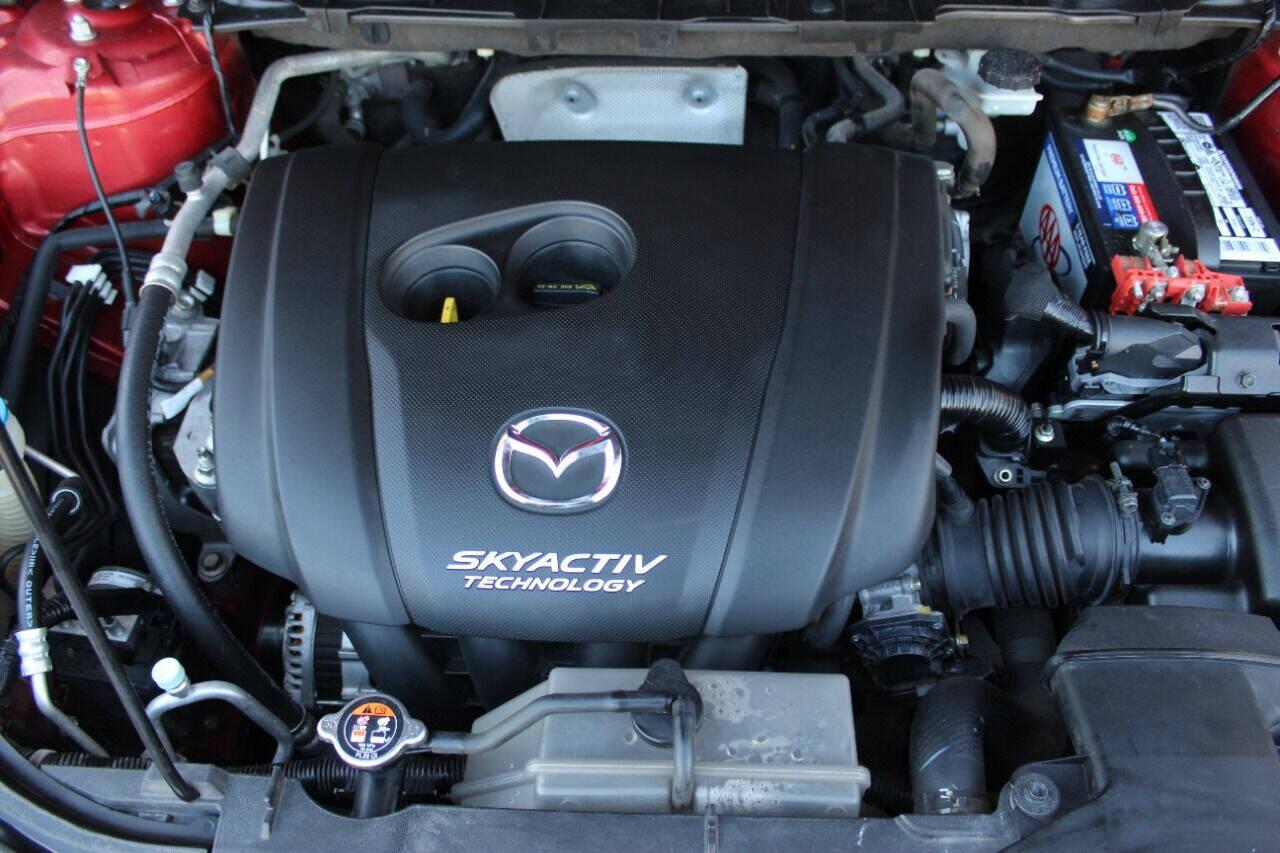 2015 Red Mazda CX-5 Touring (JM3KE2CYXF0) with an 2.5L L4 DOHC 16V engine, 6-Speed Automatic transmission, located at 4301 NW 39th , Oklahoma City, OK, 73112, (405) 949-5600, 35.512135, -97.598671 - NO DRIVERS LICENCE - NO FULL COVERAGE INSURANCE - NO CREDIT CHECK. COME ON OVER TO SUPERSPORTS AND TAKE A LOOK AND TEST DRIVE. PLEASE GIVE US A CALL AT (405) 949-5600. NO LICENCIA DE MANEJAR - NO SEGURO DE COBERTURA TOTAL - NO VERIFICACION DE CREDITO. POR FAVOR VENGAN A SUPERSPO - Photo#7