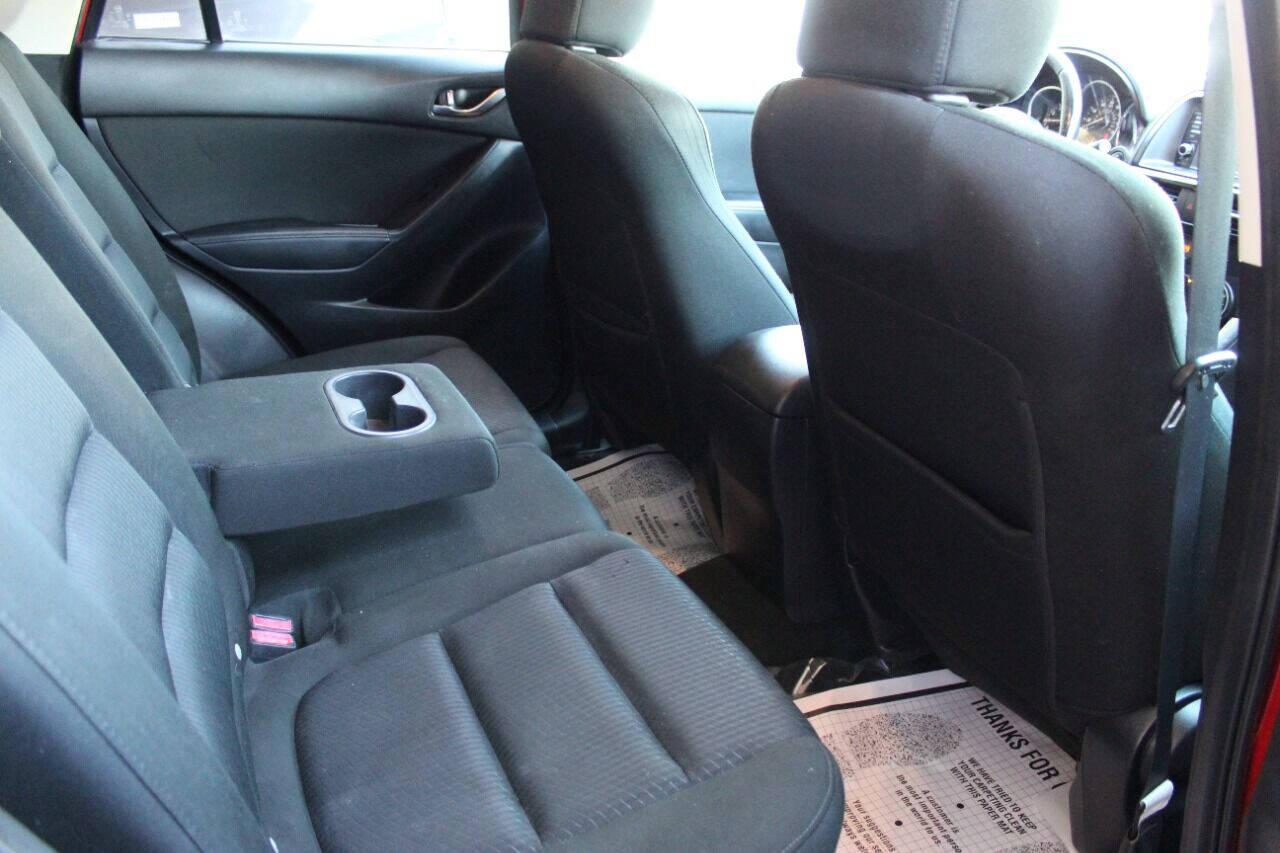 2015 Red Mazda CX-5 Touring (JM3KE2CYXF0) with an 2.5L L4 DOHC 16V engine, 6-Speed Automatic transmission, located at 4301 NW 39th , Oklahoma City, OK, 73112, (405) 949-5600, 35.512135, -97.598671 - NO DRIVERS LICENCE - NO FULL COVERAGE INSURANCE - NO CREDIT CHECK. COME ON OVER TO SUPERSPORTS AND TAKE A LOOK AND TEST DRIVE. PLEASE GIVE US A CALL AT (405) 949-5600. NO LICENCIA DE MANEJAR - NO SEGURO DE COBERTURA TOTAL - NO VERIFICACION DE CREDITO. POR FAVOR VENGAN A SUPERSPO - Photo#10