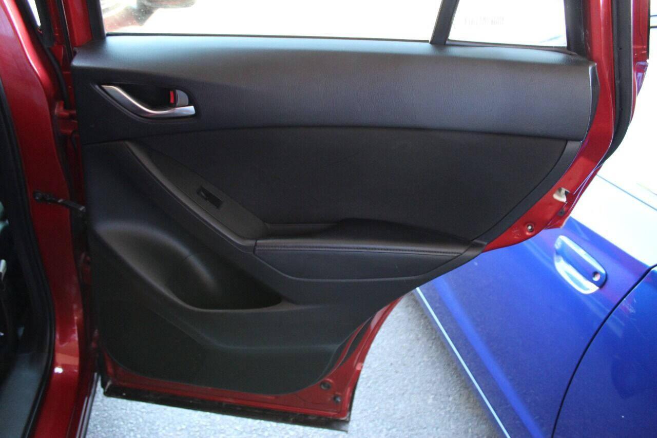 2015 Red Mazda CX-5 Touring (JM3KE2CYXF0) with an 2.5L L4 DOHC 16V engine, 6-Speed Automatic transmission, located at 4301 NW 39th , Oklahoma City, OK, 73112, (405) 949-5600, 35.512135, -97.598671 - NO DRIVERS LICENCE - NO FULL COVERAGE INSURANCE - NO CREDIT CHECK. COME ON OVER TO SUPERSPORTS AND TAKE A LOOK AND TEST DRIVE. PLEASE GIVE US A CALL AT (405) 949-5600. NO LICENCIA DE MANEJAR - NO SEGURO DE COBERTURA TOTAL - NO VERIFICACION DE CREDITO. POR FAVOR VENGAN A SUPERSPO - Photo#11