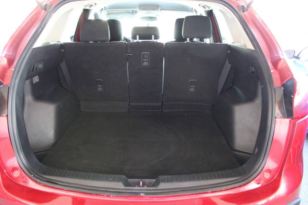 2015 Red Mazda CX-5 Touring (JM3KE2CYXF0) with an 2.5L L4 DOHC 16V engine, 6-Speed Automatic transmission, located at 4301 NW 39th , Oklahoma City, OK, 73112, (405) 949-5600, 35.512135, -97.598671 - NO DRIVERS LICENCE - NO FULL COVERAGE INSURANCE - NO CREDIT CHECK. COME ON OVER TO SUPERSPORTS AND TAKE A LOOK AND TEST DRIVE. PLEASE GIVE US A CALL AT (405) 949-5600. NO LICENCIA DE MANEJAR - NO SEGURO DE COBERTURA TOTAL - NO VERIFICACION DE CREDITO. POR FAVOR VENGAN A SUPERSPO - Photo#12