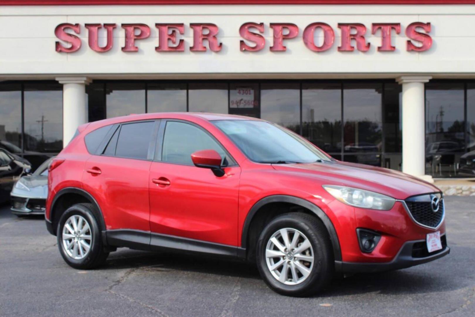 2015 Red Mazda CX-5 Touring (JM3KE2CYXF0) with an 2.5L L4 DOHC 16V engine, 6-Speed Automatic transmission, located at 4301 NW 39th , Oklahoma City, OK, 73112, (405) 949-5600, 35.512135, -97.598671 - NO DRIVERS LICENCE - NO FULL COVERAGE INSURANCE - NO CREDIT CHECK. COME ON OVER TO SUPERSPORTS AND TAKE A LOOK AND TEST DRIVE. PLEASE GIVE US A CALL AT (405) 949-5600. NO LICENCIA DE MANEJAR - NO SEGURO DE COBERTURA TOTAL - NO VERIFICACION DE CREDITO. POR FAVOR VENGAN A SUPERSPO - Photo#0