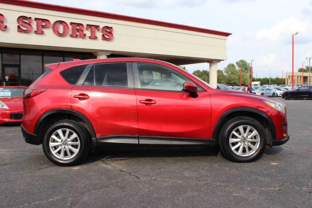 2015 Red Mazda CX-5 Touring (JM3KE2CYXF0) with an 2.5L L4 DOHC 16V engine, 6-Speed Automatic transmission, located at 4301 NW 39th , Oklahoma City, OK, 73112, (405) 949-5600, 35.512135, -97.598671 - NO DRIVERS LICENCE - NO FULL COVERAGE INSURANCE - NO CREDIT CHECK. COME ON OVER TO SUPERSPORTS AND TAKE A LOOK AND TEST DRIVE. PLEASE GIVE US A CALL AT (405) 949-5600. NO LICENCIA DE MANEJAR - NO SEGURO DE COBERTURA TOTAL - NO VERIFICACION DE CREDITO. POR FAVOR VENGAN A SUPERSPO - Photo#2