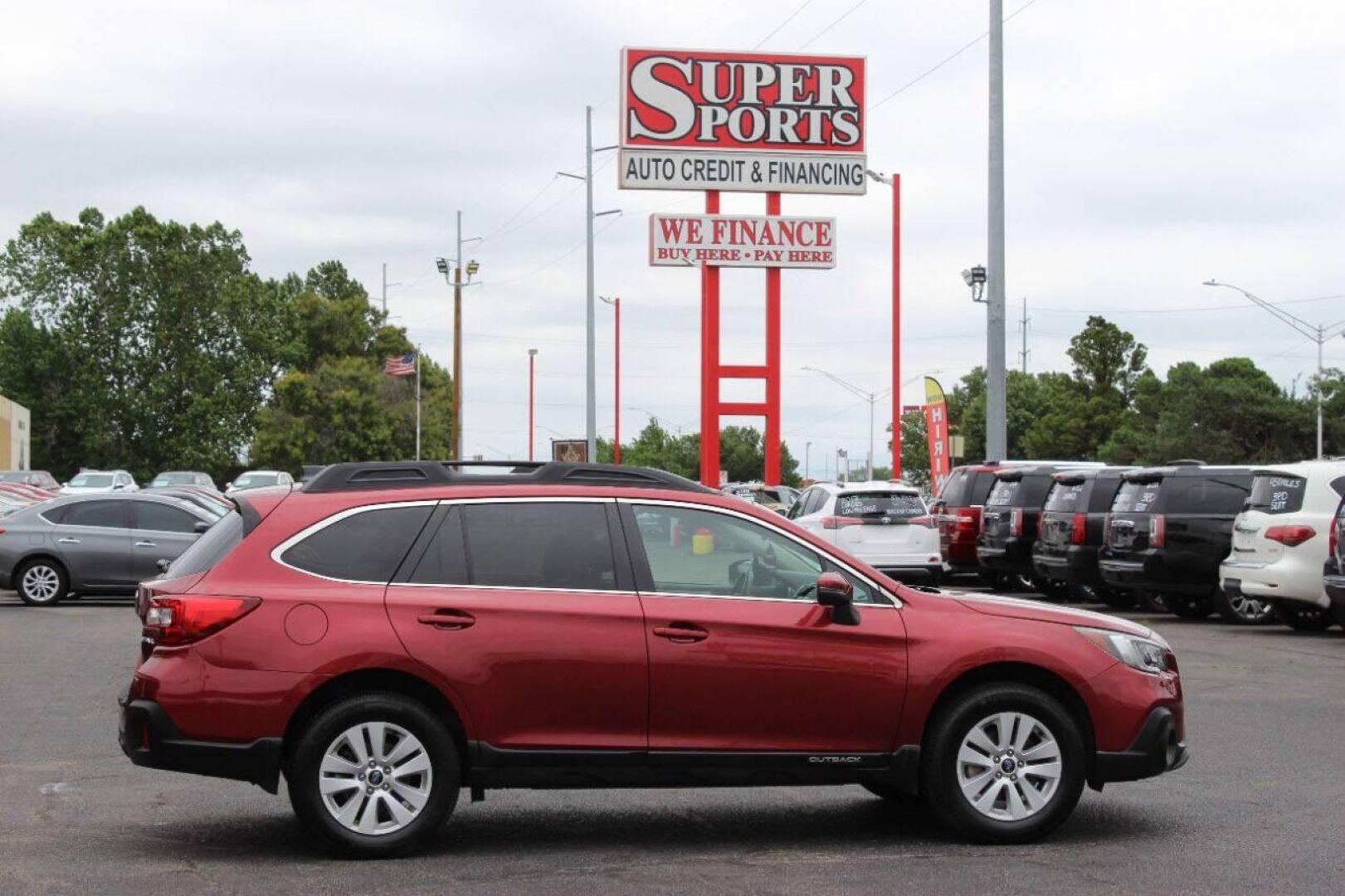 2019 Red Subaru Outback 2.5i Premium (4S4BSAHC1K3) with an 2.5L H4 DOHC 16V engine, CVT transmission, located at 4301 NW 39th , Oklahoma City, OK, 73112, (405) 949-5600, 35.512135, -97.598671 - NO DRIVERS LICENCE NO-FULL COVERAGE INSURANCE-NO CREDIT CHECK. COME ON OVER TO SUPERSPORTS AND TAKE A LOOK AND TEST DRIVE PLEASE GIVE US A CALL AT (405) 949-5600. NO LICENSIA DE MANEJAR- NO SEGURO DE COBERTURA TOTAL- NO VERIFICACCION DE CREDITO. POR FAVOR VENGAN A SUPERSPORTS, ECHE UN - Photo#3