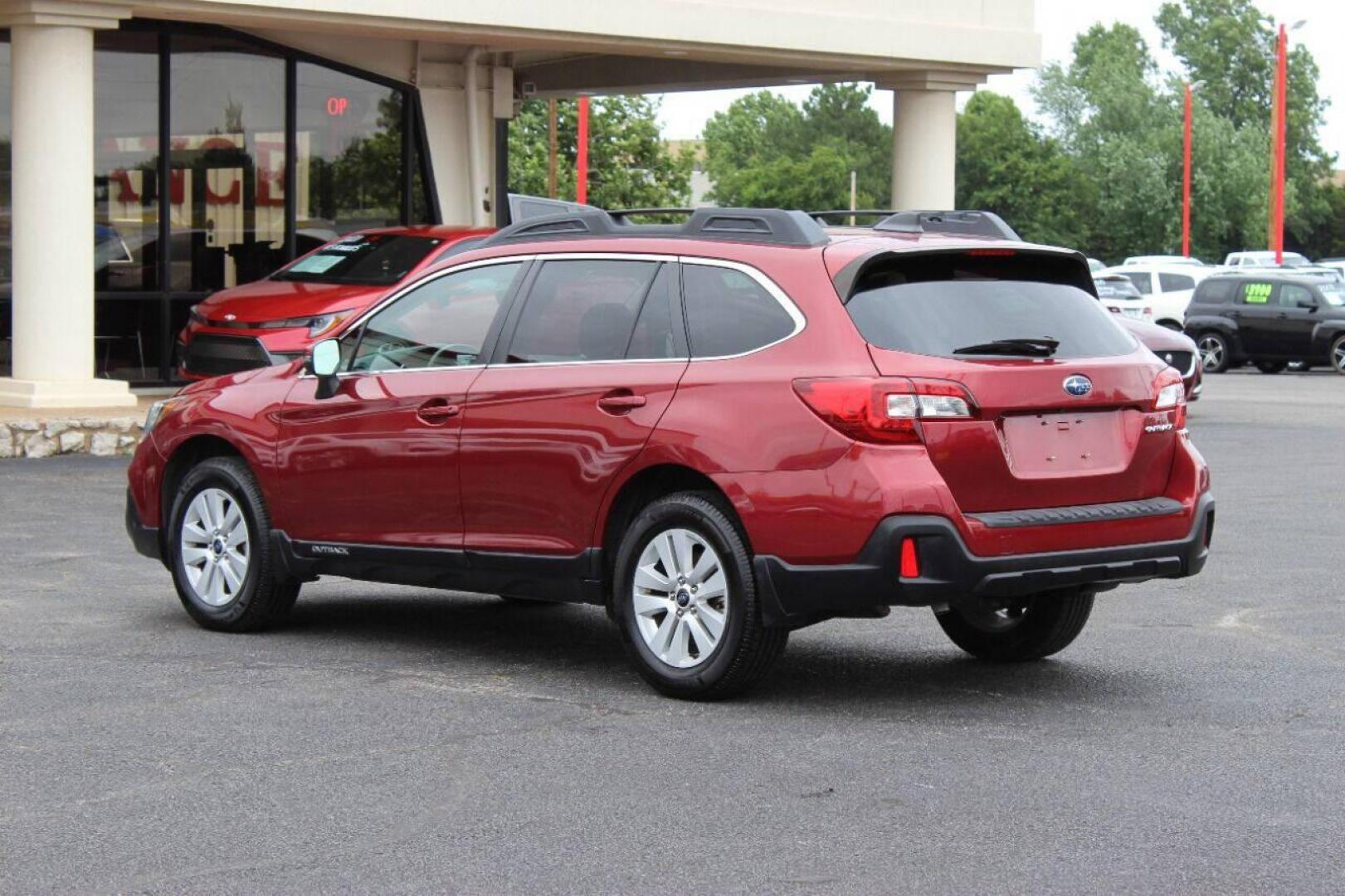 2019 Red Subaru Outback 2.5i Premium (4S4BSAHC1K3) with an 2.5L H4 DOHC 16V engine, CVT transmission, located at 4301 NW 39th , Oklahoma City, OK, 73112, (405) 949-5600, 35.512135, -97.598671 - NO DRIVERS LICENCE NO-FULL COVERAGE INSURANCE-NO CREDIT CHECK. COME ON OVER TO SUPERSPORTS AND TAKE A LOOK AND TEST DRIVE PLEASE GIVE US A CALL AT (405) 949-5600. NO LICENSIA DE MANEJAR- NO SEGURO DE COBERTURA TOTAL- NO VERIFICACCION DE CREDITO. POR FAVOR VENGAN A SUPERSPORTS, ECHE UN - Photo#5