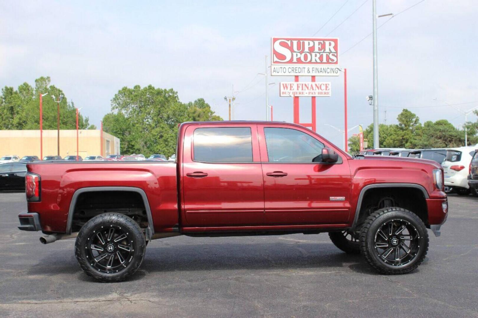 2017 Maroon GMC Sierra 1500 SLT Crew Cab Long Box 4WD (3GTU2NEC4HG) with an 5.3L V8 5.3L V8 engine, Automatic 6-Speed transmission, located at 4301 NW 39th , Oklahoma City, OK, 73112, (405) 949-5600, 35.512135, -97.598671 - NO DRIVERS LICENCE NO-FULL COVERAGE INSURANCE-NO CREDIT CHECK. COME ON OVER TO SUPERSPORTS AND TAKE A LOOK AND TEST DRIVE. PLEASE GIVE US A CALL AT (405) 949-5600. NO LICENSIA DE MANEJAR- NO SEGURO DE COBERTURA TOTAL- NO VERIFICACCION DE CREDITO. POR FAVOR VENGAN A SUPERSPORTS, ECHE UN - Photo#2
