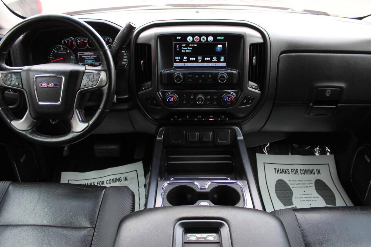 2017 Maroon GMC Sierra 1500 SLT Crew Cab Long Box 4WD (3GTU2NEC4HG) with an 5.3L V8 5.3L V8 engine, Automatic 6-Speed transmission, located at 4301 NW 39th , Oklahoma City, OK, 73112, (405) 949-5600, 35.512135, -97.598671 - NO DRIVERS LICENCE NO-FULL COVERAGE INSURANCE-NO CREDIT CHECK. COME ON OVER TO SUPERSPORTS AND TAKE A LOOK AND TEST DRIVE. PLEASE GIVE US A CALL AT (405) 949-5600. NO LICENSIA DE MANEJAR- NO SEGURO DE COBERTURA TOTAL- NO VERIFICACCION DE CREDITO. POR FAVOR VENGAN A SUPERSPORTS, ECHE UN - Photo#17