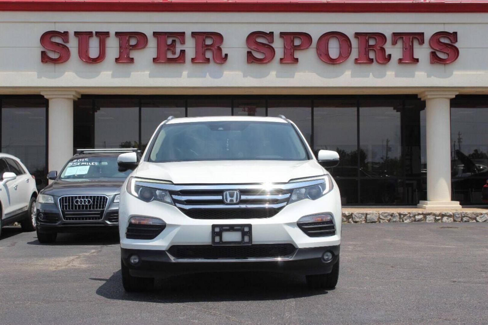2017 White Honda Pilot Touring 2WD (5FNYF5H96HB) with an 3.5L V6 SOHC 24V engine, 9A transmission, located at 4301 NW 39th , Oklahoma City, OK, 73112, (405) 949-5600, 35.512135, -97.598671 - NO DRIVERS LICENCE NO-FULL COVERAGE INSURANCE-NO CREDIT CHECK. COME ON OVER TO SUPERSPORTS AND TAKE A LOOK AND TEST DRIVE PLEASE GIVE US A CALL AT (405) 949-5600. NO LICENSIA DE MANEJAR- NO SEGURO DE COBERTURA TOTAL- NO VERIFICACCION DE CREDITO. POR FAVOR VENGAN A SUPERSPORTS, ECHE UN VI - Photo#0