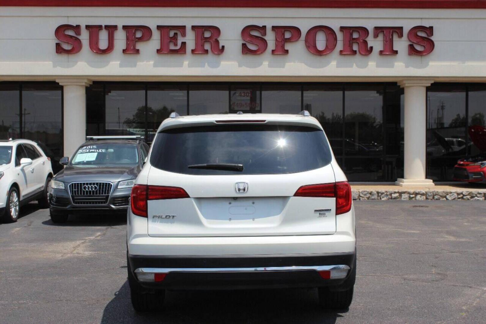 2017 White Honda Pilot Touring 2WD (5FNYF5H96HB) with an 3.5L V6 SOHC 24V engine, 9A transmission, located at 4301 NW 39th , Oklahoma City, OK, 73112, (405) 949-5600, 35.512135, -97.598671 - NO DRIVERS LICENCE NO-FULL COVERAGE INSURANCE-NO CREDIT CHECK. COME ON OVER TO SUPERSPORTS AND TAKE A LOOK AND TEST DRIVE PLEASE GIVE US A CALL AT (405) 949-5600. NO LICENSIA DE MANEJAR- NO SEGURO DE COBERTURA TOTAL- NO VERIFICACCION DE CREDITO. POR FAVOR VENGAN A SUPERSPORTS, ECHE UN VI - Photo#4