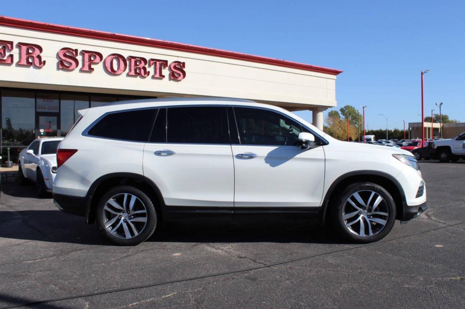 2017 White Honda Pilot Touring 2WD (5FNYF5H96HB) with an 3.5L V6 SOHC 24V engine, 9A transmission, located at 4301 NW 39th , Oklahoma City, OK, 73112, (405) 949-5600, 35.512135, -97.598671 - NO DRIVERS LICENCE NO-FULL COVERAGE INSURANCE-NO CREDIT CHECK. COME ON OVER TO SUPERSPORTS AND TAKE A LOOK AND TEST DRIVE PLEASE GIVE US A CALL AT (405) 949-5600. NO LICENSIA DE MANEJAR- NO SEGURO DE COBERTURA TOTAL- NO VERIFICACCION DE CREDITO. POR FAVOR VENGAN A SUPERSPORTS, ECHE UN VI - Photo#2