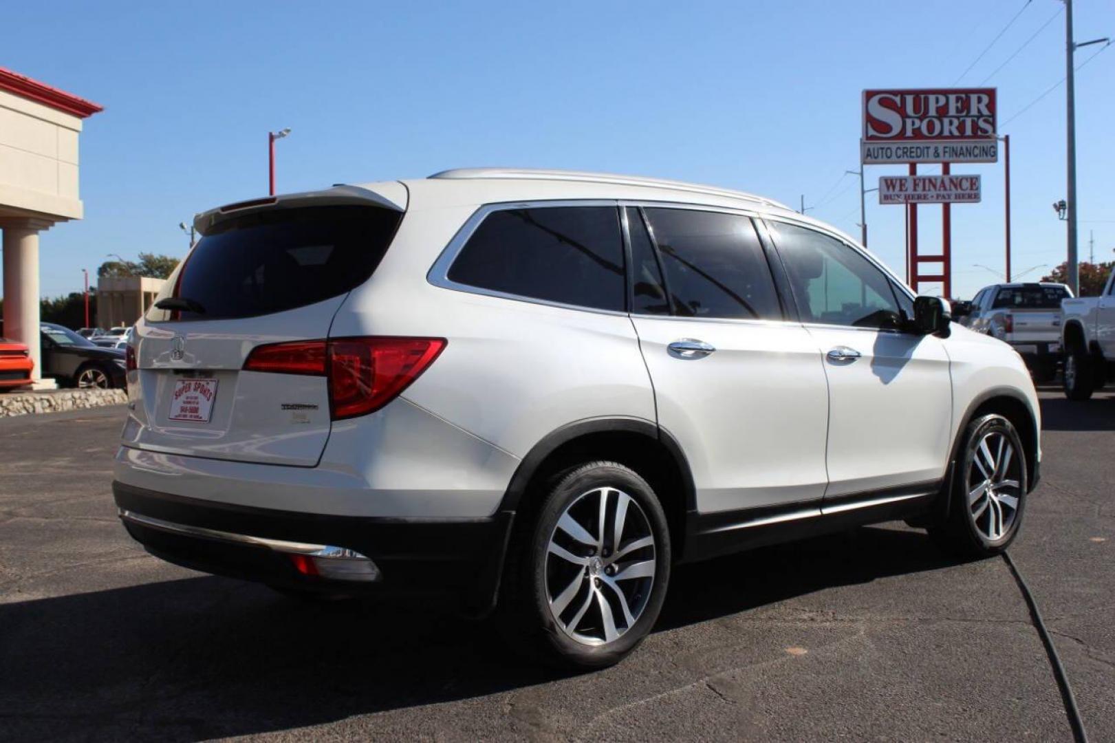 2017 White Honda Pilot Touring 2WD (5FNYF5H96HB) with an 3.5L V6 SOHC 24V engine, 9A transmission, located at 4301 NW 39th , Oklahoma City, OK, 73112, (405) 949-5600, 35.512135, -97.598671 - NO DRIVERS LICENCE NO-FULL COVERAGE INSURANCE-NO CREDIT CHECK. COME ON OVER TO SUPERSPORTS AND TAKE A LOOK AND TEST DRIVE PLEASE GIVE US A CALL AT (405) 949-5600. NO LICENSIA DE MANEJAR- NO SEGURO DE COBERTURA TOTAL- NO VERIFICACCION DE CREDITO. POR FAVOR VENGAN A SUPERSPORTS, ECHE UN VI - Photo#3