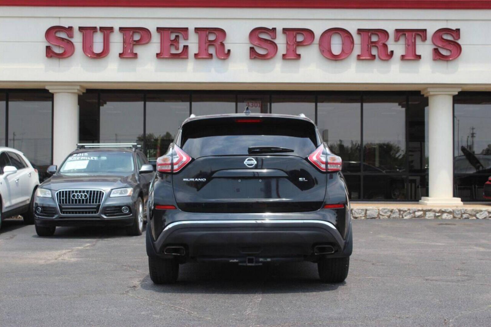 2016 Black Nissan Murano Platinum FWD (5N1AZ2MG6GN) with an 3.5L V6 DOHC 24V engine, CVT transmission, located at 4301 NW 39th , Oklahoma City, OK, 73112, (405) 949-5600, 35.512135, -97.598671 - NO DRIVERS LICENCE NO-FULL COVERAGE INSURANCE-NO CREDIT CHECK. COME ON OVER TO SUPERSPORTS AND TAKE A LOOK AND TEST DRIVE. PLEASE GIVE US A CALL AT (405) 949-5600. NO LICENSIA DE MANEJAR- NO SEGURO DE COBERTURA TOTAL- NO VERIFICACCION DE CREDITO. POR FAVOR VENGAN A SUPERSPORTS, ECHE UN - Photo#4