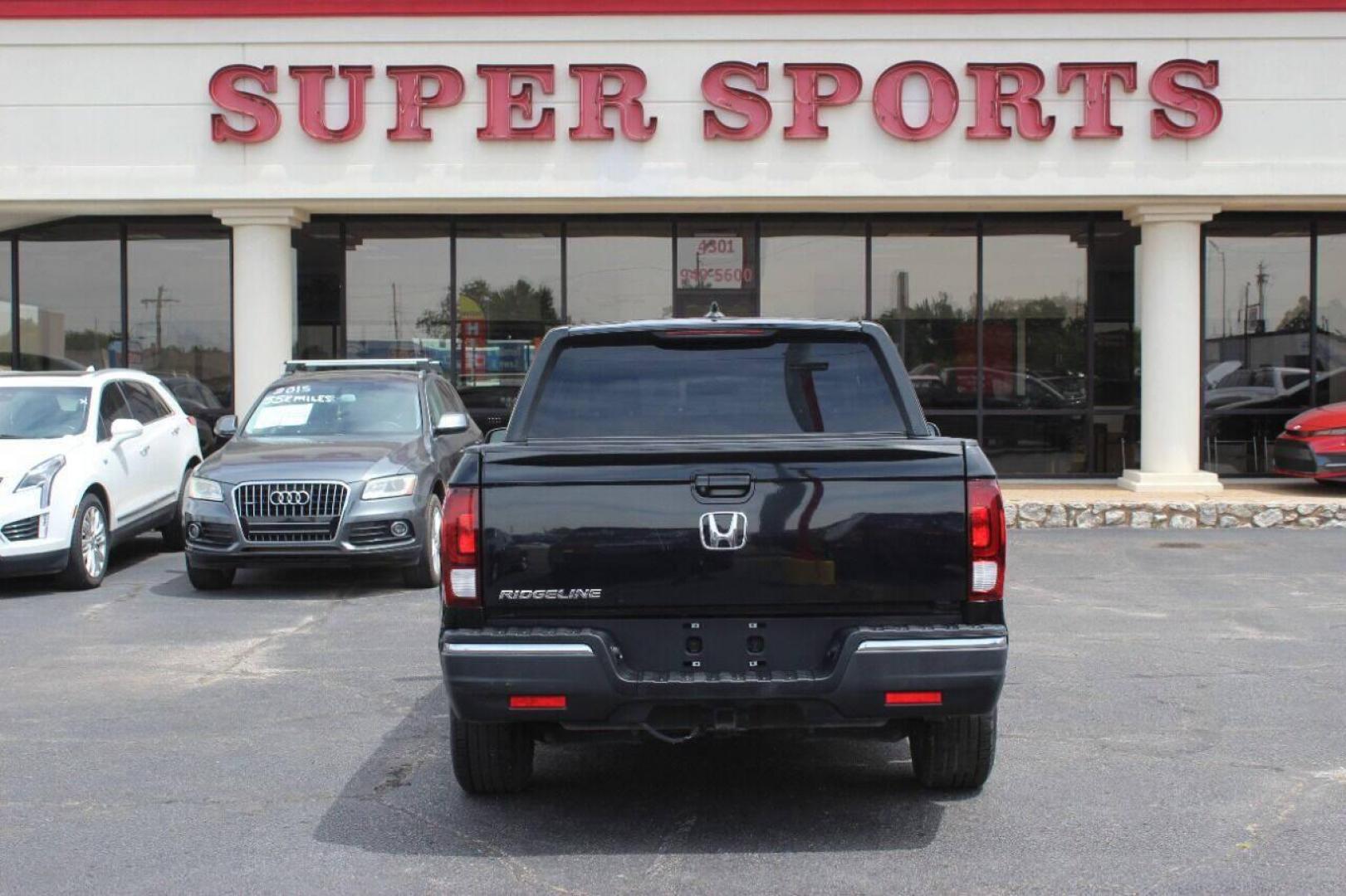2017 Black Honda Ridgeline RTL-T (5FPYK2F61HB) with an 3.5L V6 SOHC 24V engine, 6A transmission, located at 4301 NW 39th , Oklahoma City, OK, 73112, (405) 949-5600, 35.512135, -97.598671 - NO DRIVERS LICENCE NO-FULL COVERAGE INSURANCE-NO CREDIT CHECK. COME ON OVER TO SUPERSPORTS AND TAKE A LOOK AND TEST DRIVE. PLEASE GIVE US A CALL AT (405) 949-5600. NO LICENSIA DE MANEJAR- NO SEGURO DE COBERTURA TOTAL- NO VERIFICACCION DE CREDITO. POR FAVOR VENGAN A SUPERSPORTS, ECHE UN - Photo#5