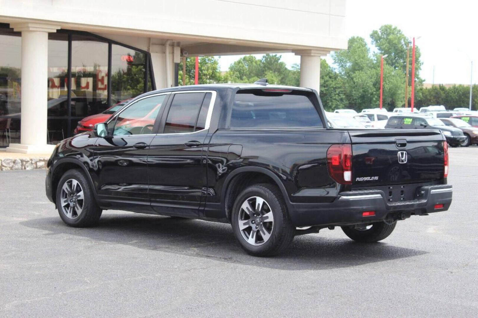 2017 Black Honda Ridgeline RTL-T (5FPYK2F61HB) with an 3.5L V6 SOHC 24V engine, 6A transmission, located at 4301 NW 39th , Oklahoma City, OK, 73112, (405) 949-5600, 35.512135, -97.598671 - NO DRIVERS LICENCE NO-FULL COVERAGE INSURANCE-NO CREDIT CHECK. COME ON OVER TO SUPERSPORTS AND TAKE A LOOK AND TEST DRIVE. PLEASE GIVE US A CALL AT (405) 949-5600. NO LICENSIA DE MANEJAR- NO SEGURO DE COBERTURA TOTAL- NO VERIFICACCION DE CREDITO. POR FAVOR VENGAN A SUPERSPORTS, ECHE UN - Photo#6