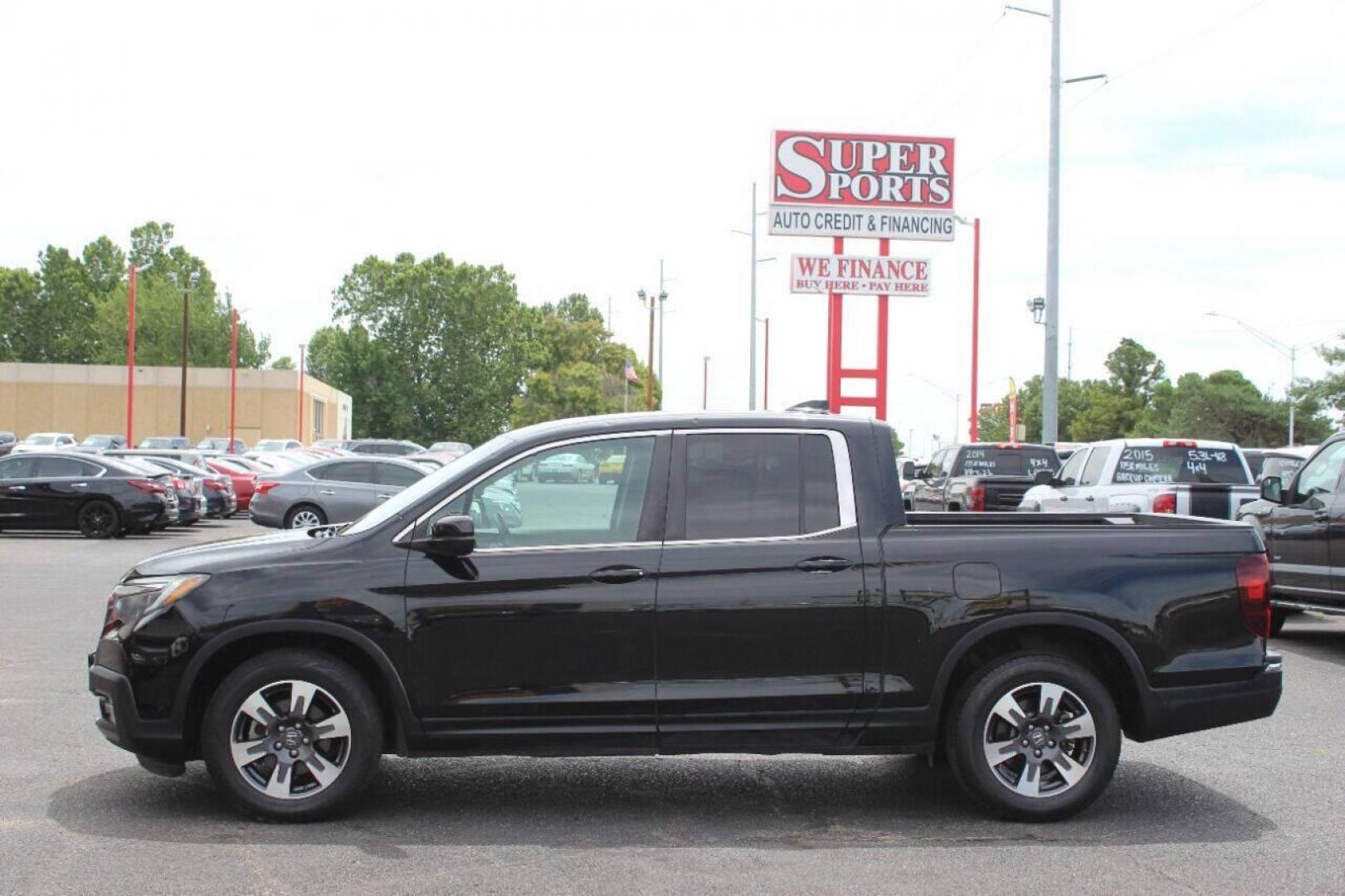 2017 Black Honda Ridgeline RTL-T (5FPYK2F61HB) with an 3.5L V6 SOHC 24V engine, 6A transmission, located at 4301 NW 39th , Oklahoma City, OK, 73112, (405) 949-5600, 35.512135, -97.598671 - NO DRIVERS LICENCE NO-FULL COVERAGE INSURANCE-NO CREDIT CHECK. COME ON OVER TO SUPERSPORTS AND TAKE A LOOK AND TEST DRIVE. PLEASE GIVE US A CALL AT (405) 949-5600. NO LICENSIA DE MANEJAR- NO SEGURO DE COBERTURA TOTAL- NO VERIFICACCION DE CREDITO. POR FAVOR VENGAN A SUPERSPORTS, ECHE UN - Photo#7
