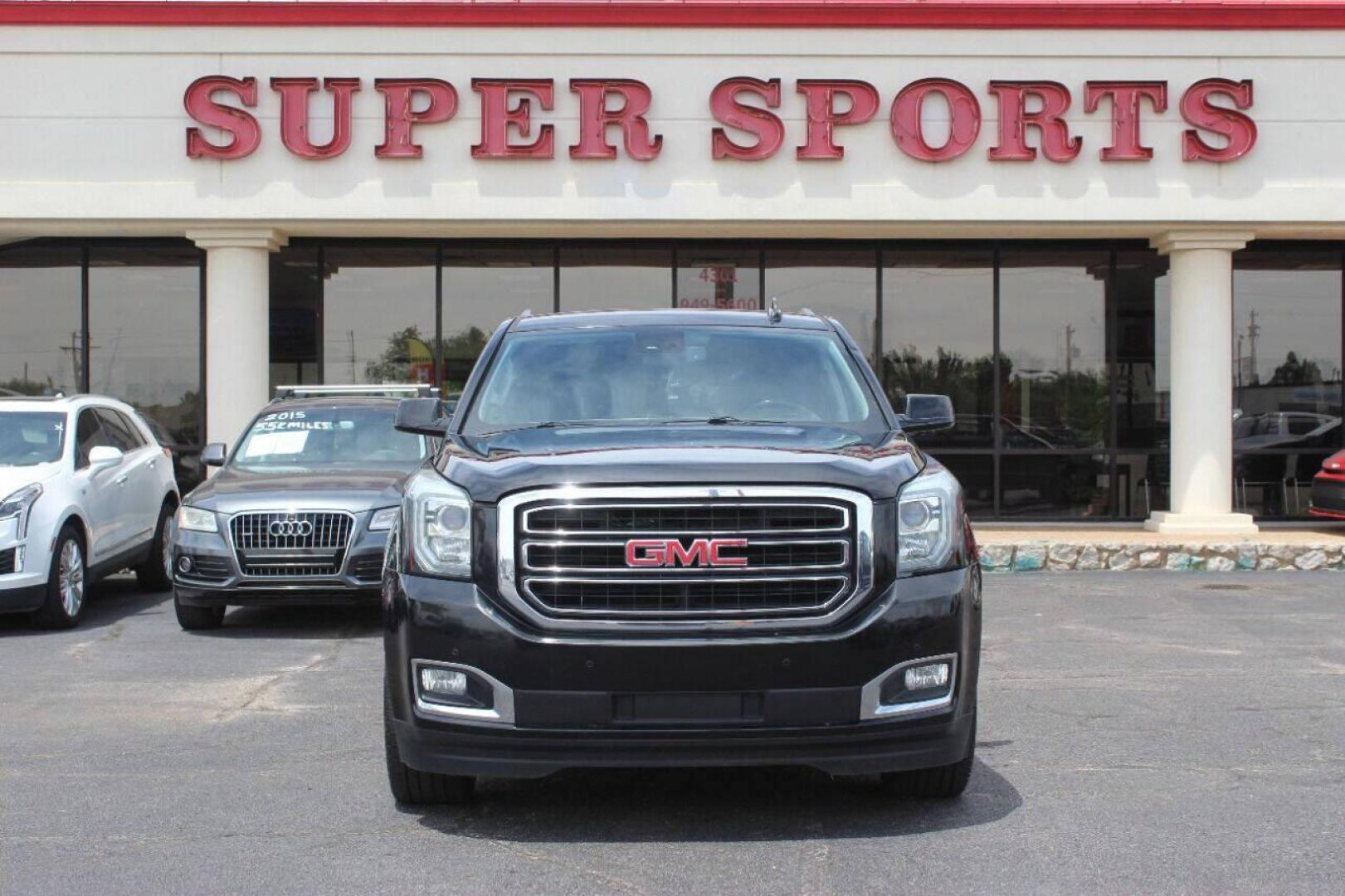 2017 Black GMC Yukon SLT 4WD (1GKS2BKC4HR) with an 5.3L V8 OHV 16V FFV engine, 6A transmission, located at 4301 NW 39th , Oklahoma City, OK, 73112, (405) 949-5600, 35.512135, -97.598671 - NO DRIVERS LICENCE NO-FULL COVERAGE INSURANCE-NO CREDIT CHECK. COME ON OVER TO SUPERSPORTS AND TAKE A LOOK AND TEST DRIVE. PLEASE GIVE US A CALL AT (405) 949-5600. NO LICENSIA DE MANEJAR- NO SEGURO DE COBERTURA TOTAL- NO VERIFICACCION DE CREDITO. POR FAVOR VENGAN A SUPERSPORTS, ECHE UN - Photo#3