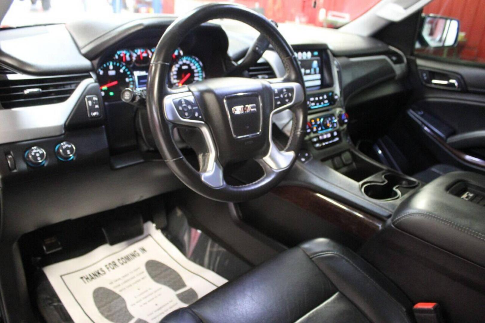 2017 Black GMC Yukon SLT 4WD (1GKS2BKC4HR) with an 5.3L V8 OHV 16V FFV engine, 6A transmission, located at 4301 NW 39th , Oklahoma City, OK, 73112, (405) 949-5600, 35.512135, -97.598671 - NO DRIVERS LICENCE NO-FULL COVERAGE INSURANCE-NO CREDIT CHECK. COME ON OVER TO SUPERSPORTS AND TAKE A LOOK AND TEST DRIVE. PLEASE GIVE US A CALL AT (405) 949-5600. NO LICENSIA DE MANEJAR- NO SEGURO DE COBERTURA TOTAL- NO VERIFICACCION DE CREDITO. POR FAVOR VENGAN A SUPERSPORTS, ECHE UN - Photo#18