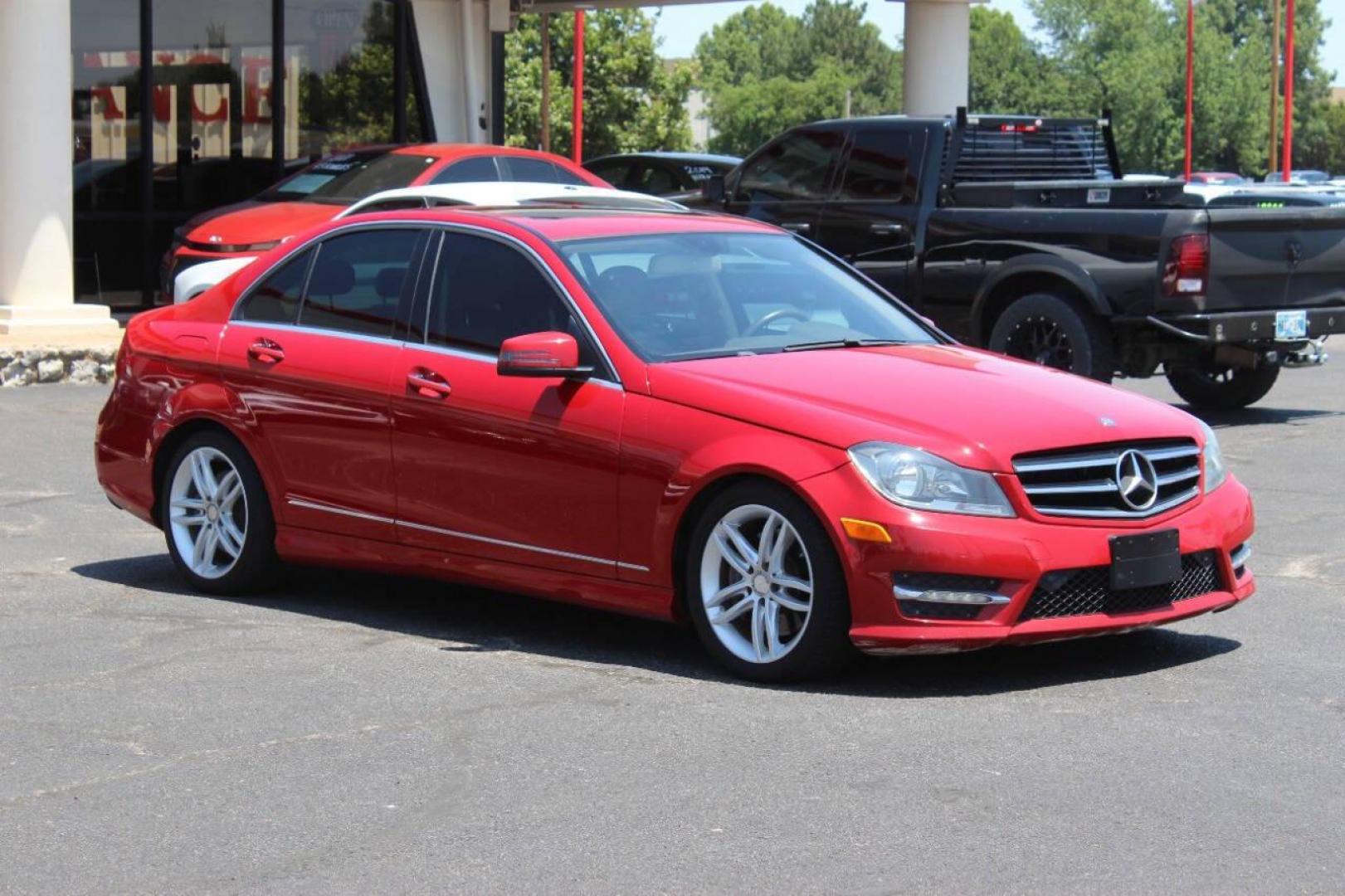 2014 Red Mercedes-Benz C-Class C300 4MATIC Sport Sedan (WDDGF8AB4ER) with an 3.0L V6 DOHC 24V engine, 7-Speed Automatic transmission, located at 4301 NW 39th , Oklahoma City, OK, 73112, (405) 949-5600, 35.512135, -97.598671 - NO DRIVERS LICENCE NO-FULL COVERAGE INSURANCE-NO CREDIT CHECK. COME ON OVER TO SUPERSPORTS AND TAKE A LOOK AND TEST DRIVE PLEASE GIVE US A CALL AT (405) 949-5600. NO LICENSIA DE MANEJAR- NO SEGURO DE COBERTURA TOTAL- NO VERIFICACCION DE CREDITO. POR FAVOR VENGAN A SUPERSPORTS, ECHE UN V - Photo#2