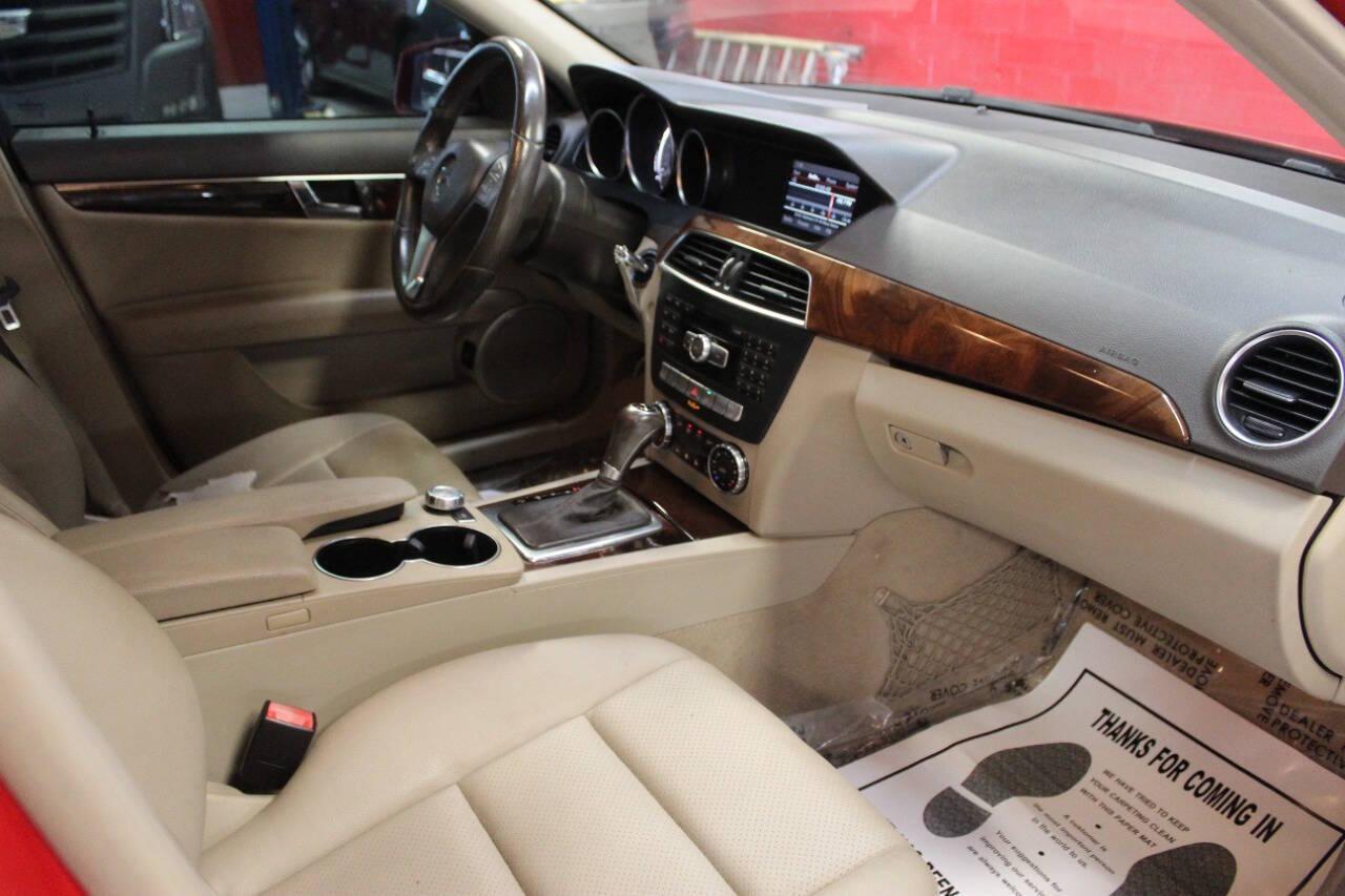 2014 Red Mercedes-Benz C-Class C300 4MATIC Sport Sedan (WDDGF8AB4ER) with an 3.0L V6 DOHC 24V engine, 7-Speed Automatic transmission, located at 4301 NW 39th , Oklahoma City, OK, 73112, (405) 949-5600, 35.512135, -97.598671 - NO DRIVERS LICENCE -NO FULL COVERAGE INSURANCE - NO CREDIT CHECK. COME ON OVER TO SUPERSPORTS, TAKE A LOOK AND TEST DRIVE. PLEASE GIVE US A CALL AT (405) 949-5600. NO LICENCIA DE CONDUCIR - NO SEGURO DE COBERTURA TOTAL - NO VERIFICACION DE CREDITO. VISITENOS EN SUPERSPORTS, MIRE N - Photo#8