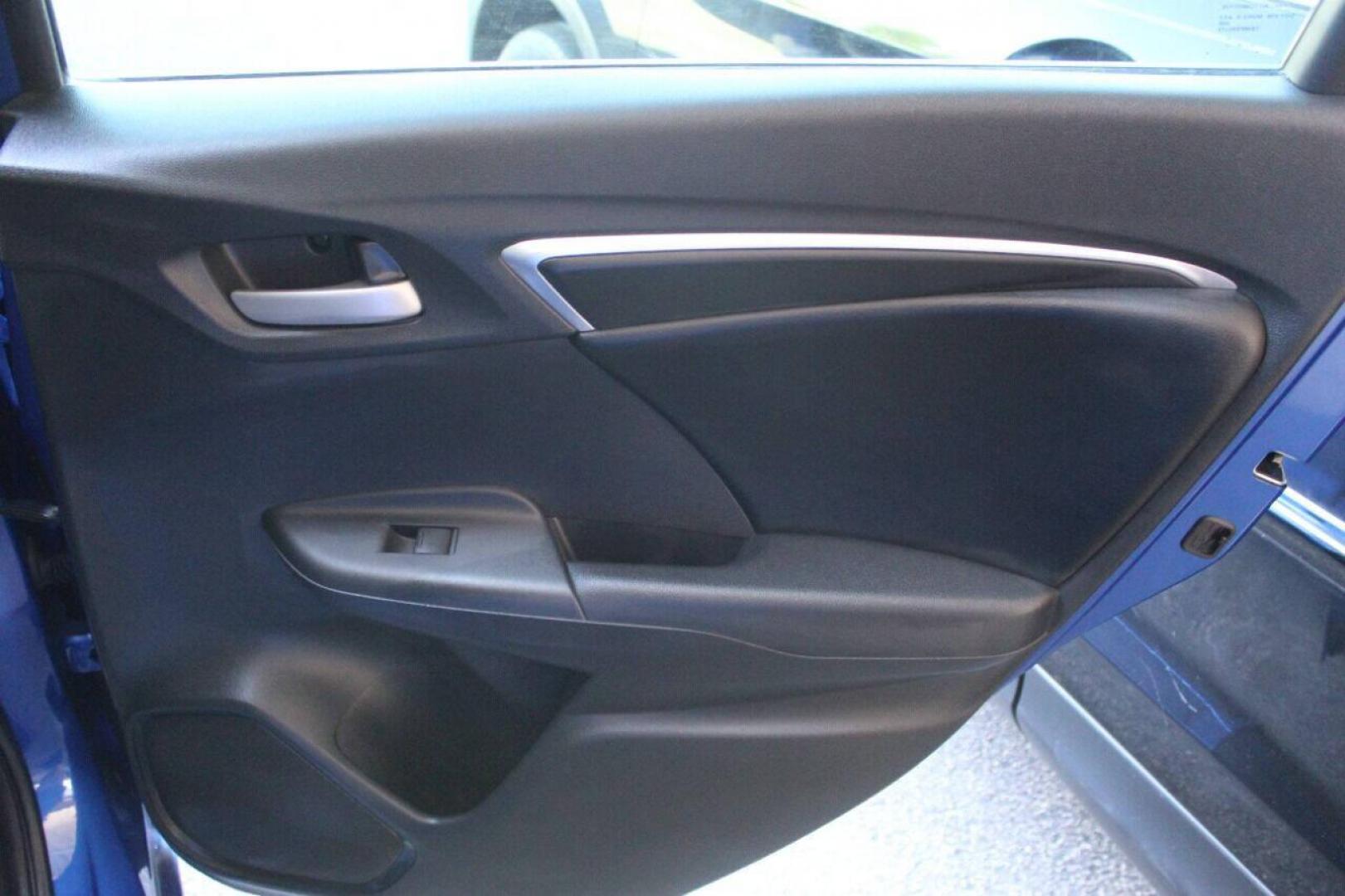 2015 Blue Honda Fit LX CVT (3HGGK5H5XFM) with an 1.5L L4 SOHC 16V engine, Continuously Variable Transmission transmission, located at 4301 NW 39th , Oklahoma City, OK, 73112, (405) 949-5600, 35.512135, -97.598671 - NO DRIVERS LICENCE NO-FULL COVERAGE INSURANCE-NO CREDIT CHECK. COME ON OVER TO SUPERSPORTS AND TAKE A LOOK AND TEST DRIVE. PLEASE GIVE US A CALL AT (405) 949-5600. NO LICENSIA DE MANEJAR- NO SEGURO DE COBERTURA TOTAL- NO VERIFICACCION DE CREDITO. POR FAVOR VENGAN A SUPERSPORTS, ECHE UN - Photo#11