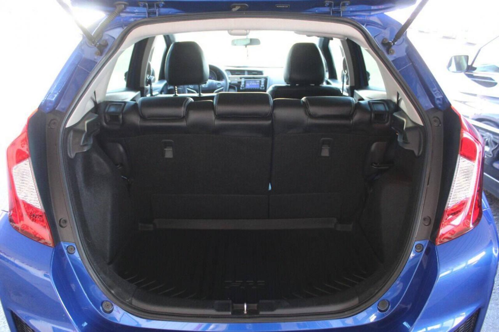 2015 Blue Honda Fit LX CVT (3HGGK5H5XFM) with an 1.5L L4 SOHC 16V engine, Continuously Variable Transmission transmission, located at 4301 NW 39th , Oklahoma City, OK, 73112, (405) 949-5600, 35.512135, -97.598671 - NO DRIVERS LICENCE NO-FULL COVERAGE INSURANCE-NO CREDIT CHECK. COME ON OVER TO SUPERSPORTS AND TAKE A LOOK AND TEST DRIVE. PLEASE GIVE US A CALL AT (405) 949-5600. NO LICENSIA DE MANEJAR- NO SEGURO DE COBERTURA TOTAL- NO VERIFICACCION DE CREDITO. POR FAVOR VENGAN A SUPERSPORTS, ECHE UN - Photo#13
