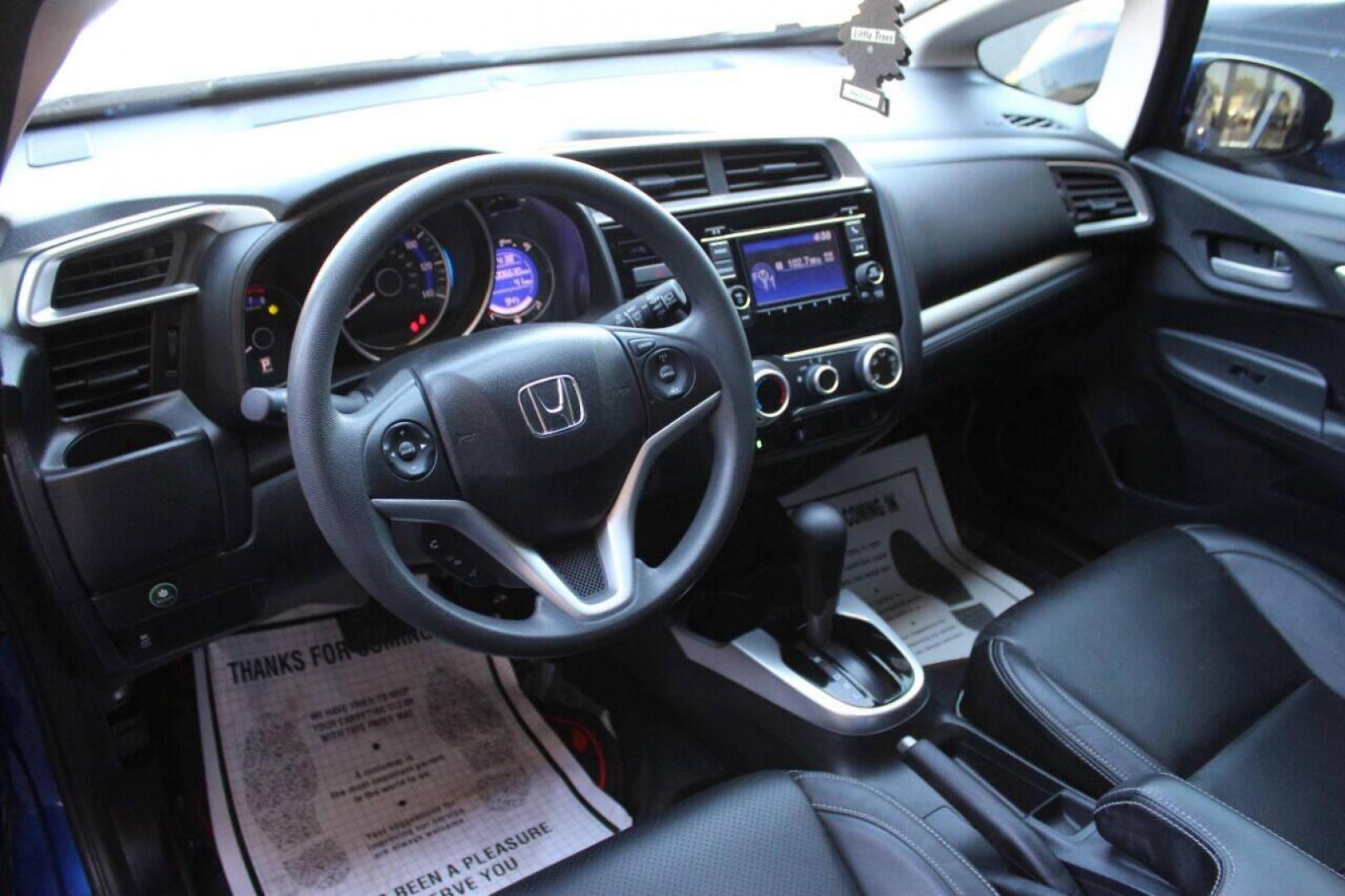 2015 Blue Honda Fit LX CVT (3HGGK5H5XFM) with an 1.5L L4 SOHC 16V engine, Continuously Variable Transmission transmission, located at 4301 NW 39th , Oklahoma City, OK, 73112, (405) 949-5600, 35.512135, -97.598671 - NO DRIVERS LICENCE NO-FULL COVERAGE INSURANCE-NO CREDIT CHECK. COME ON OVER TO SUPERSPORTS AND TAKE A LOOK AND TEST DRIVE. PLEASE GIVE US A CALL AT (405) 949-5600. NO LICENSIA DE MANEJAR- NO SEGURO DE COBERTURA TOTAL- NO VERIFICACCION DE CREDITO. POR FAVOR VENGAN A SUPERSPORTS, ECHE UN - Photo#16