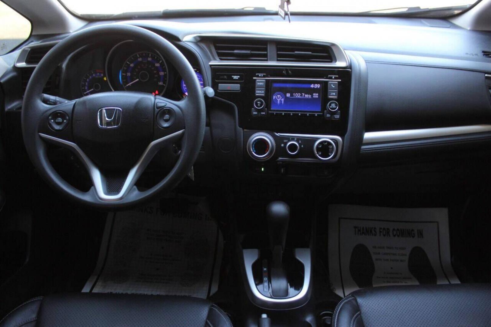 2015 Blue Honda Fit LX CVT (3HGGK5H5XFM) with an 1.5L L4 SOHC 16V engine, Continuously Variable Transmission transmission, located at 4301 NW 39th , Oklahoma City, OK, 73112, (405) 949-5600, 35.512135, -97.598671 - NO DRIVERS LICENCE NO-FULL COVERAGE INSURANCE-NO CREDIT CHECK. COME ON OVER TO SUPERSPORTS AND TAKE A LOOK AND TEST DRIVE. PLEASE GIVE US A CALL AT (405) 949-5600. NO LICENSIA DE MANEJAR- NO SEGURO DE COBERTURA TOTAL- NO VERIFICACCION DE CREDITO. POR FAVOR VENGAN A SUPERSPORTS, ECHE UN - Photo#18