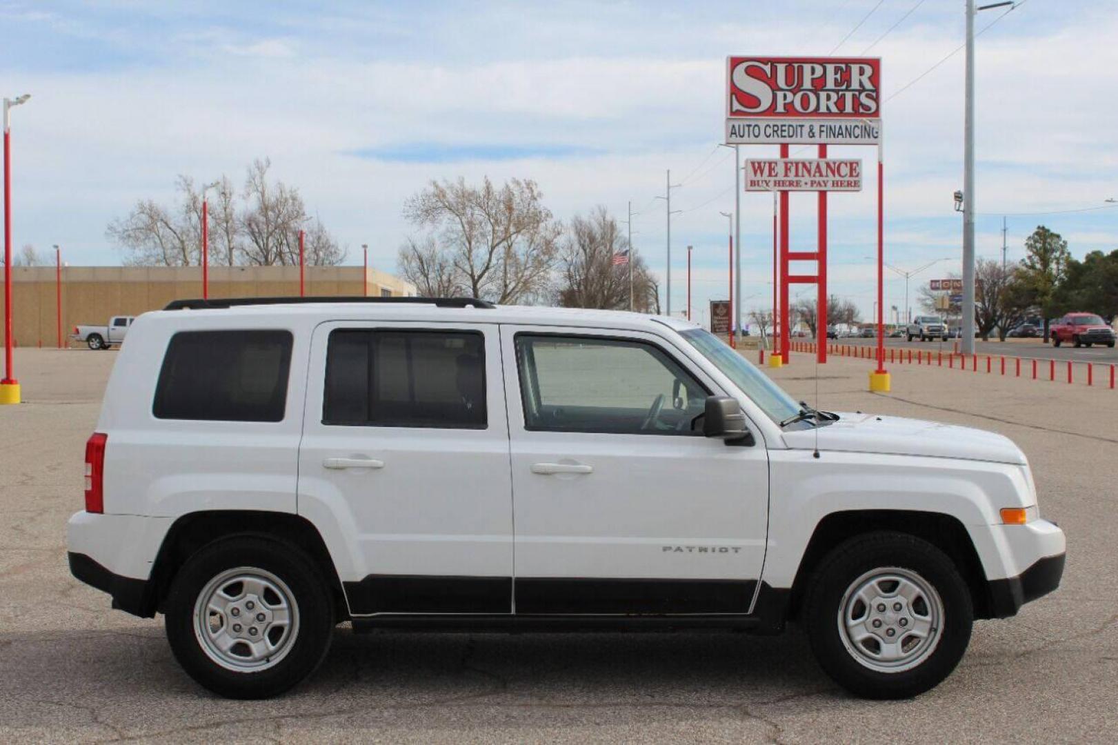 2014 White Jeep Patriot Sport 2WD (1C4NJPBB7ED) with an 2.4L L4 DOHC 16V engine, Automatic 6-Speed transmission, located at 4301 NW 39th , Oklahoma City, OK, 73112, (405) 949-5600, 35.512135, -97.598671 - NO DRIVERS LICENCE NO-FULL COVERAGE INSURANCE-NO CREDIT CHECK. COME ON OVER TO SUPERSPORTS AND TAKE A LOOK AND TEST DRIVE. PLEASE GIVE US A CALL AT (405) 949-5600. NO LICENSIA DE MANEJAR- NO SEGURO DE COBERTURA TOTAL- NO VERIFICACCION DE CREDITO. POR FAVOR VENGAN A SUPERSPORTS, ECHE UN - Photo#3