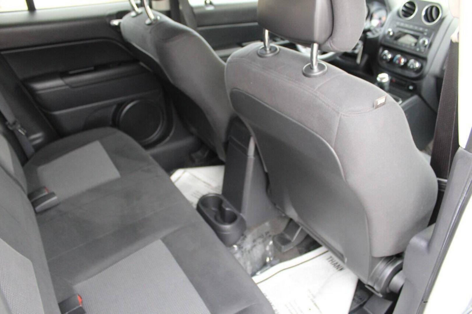 2014 White Jeep Patriot Sport 2WD (1C4NJPBB7ED) with an 2.4L L4 DOHC 16V engine, Automatic 6-Speed transmission, located at 4301 NW 39th , Oklahoma City, OK, 73112, (405) 949-5600, 35.512135, -97.598671 - NO DRIVERS LICENCE NO-FULL COVERAGE INSURANCE-NO CREDIT CHECK. COME ON OVER TO SUPERSPORTS AND TAKE A LOOK AND TEST DRIVE. PLEASE GIVE US A CALL AT (405) 949-5600. NO LICENSIA DE MANEJAR- NO SEGURO DE COBERTURA TOTAL- NO VERIFICACCION DE CREDITO. POR FAVOR VENGAN A SUPERSPORTS, ECHE UN - Photo#10