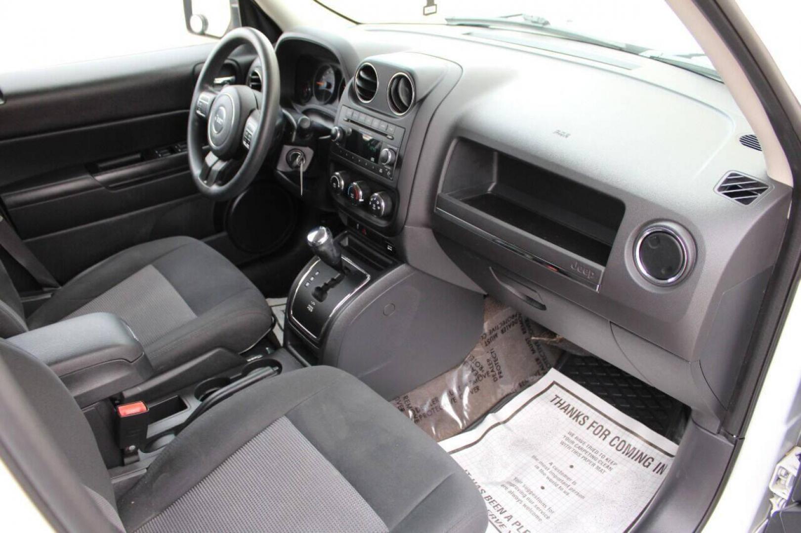 2014 White Jeep Patriot Sport 2WD (1C4NJPBB7ED) with an 2.4L L4 DOHC 16V engine, Automatic 6-Speed transmission, located at 4301 NW 39th , Oklahoma City, OK, 73112, (405) 949-5600, 35.512135, -97.598671 - NO DRIVERS LICENCE NO-FULL COVERAGE INSURANCE-NO CREDIT CHECK. COME ON OVER TO SUPERSPORTS AND TAKE A LOOK AND TEST DRIVE. PLEASE GIVE US A CALL AT (405) 949-5600. NO LICENSIA DE MANEJAR- NO SEGURO DE COBERTURA TOTAL- NO VERIFICACCION DE CREDITO. POR FAVOR VENGAN A SUPERSPORTS, ECHE UN - Photo#8